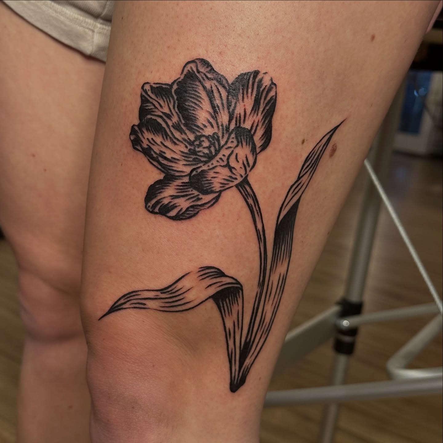 Peony black and grey tattoo on the thigh by 𝓡𝓸𝓼𝓮 𝓗𝓪𝔂𝓮𝓼