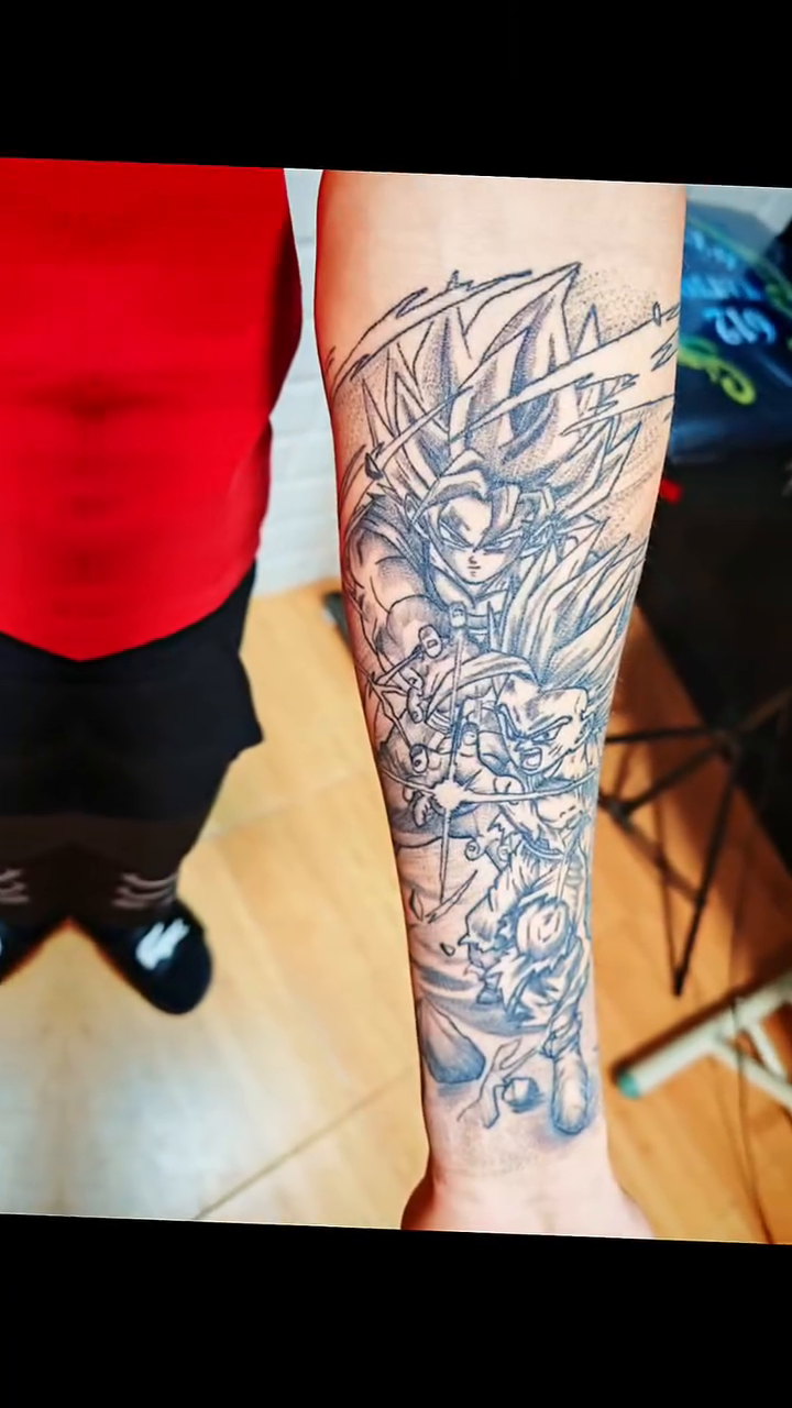 Goku from Dragon Ball Z anime tattoo on the forearm by Juanma Martin