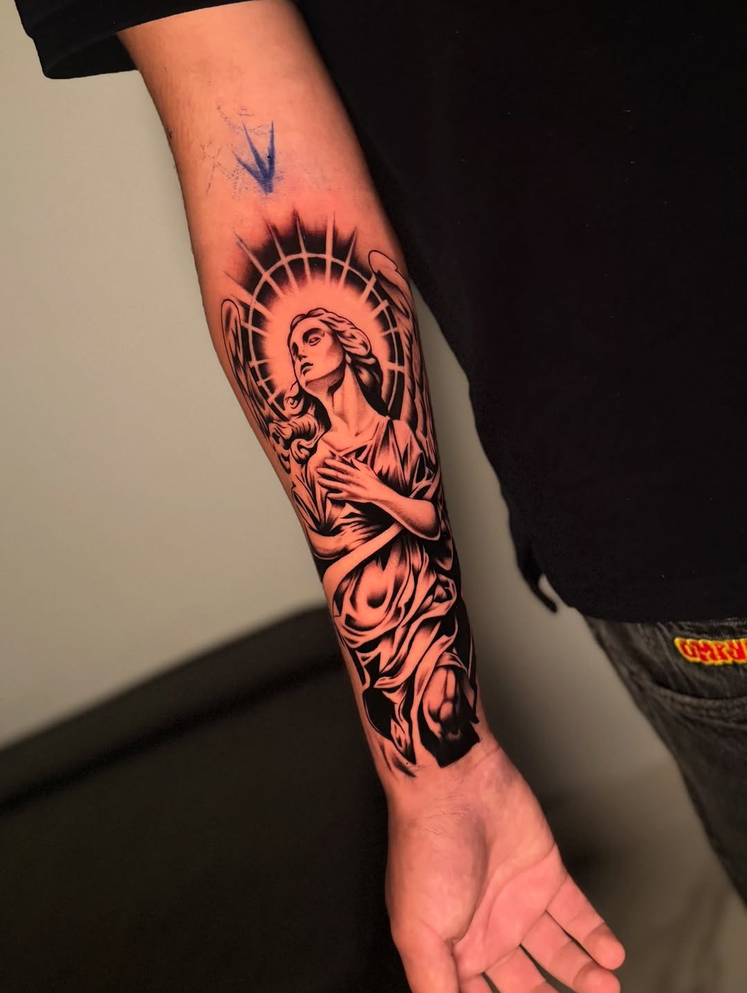 Angel realism tattoo on the forearm by InkbyCasillas