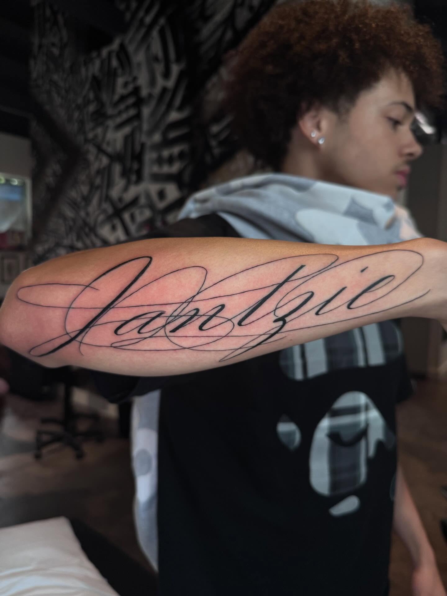 Script lettering lettering script tattoo on the forearm by Gabrielle Mack