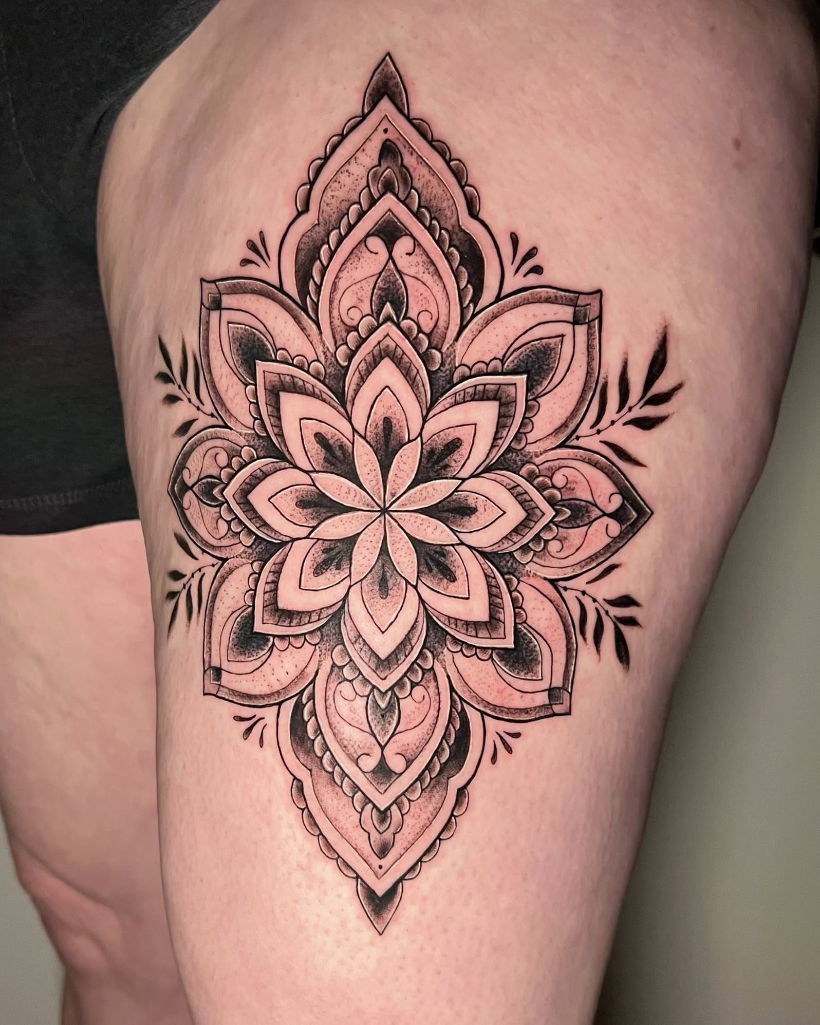 Mandala dotwork tattoo on the thigh by Jessica Kloos
