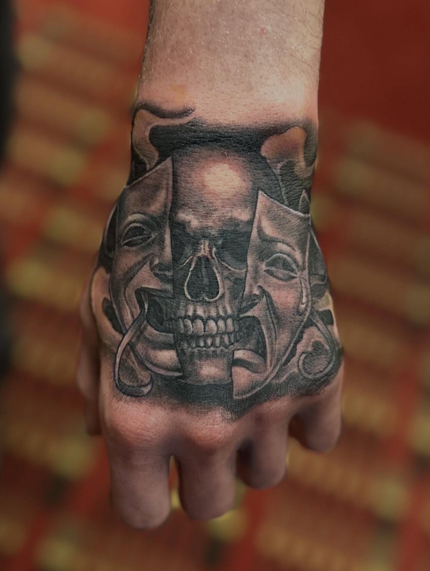 Skull realism tattoo on the hand by Ruben