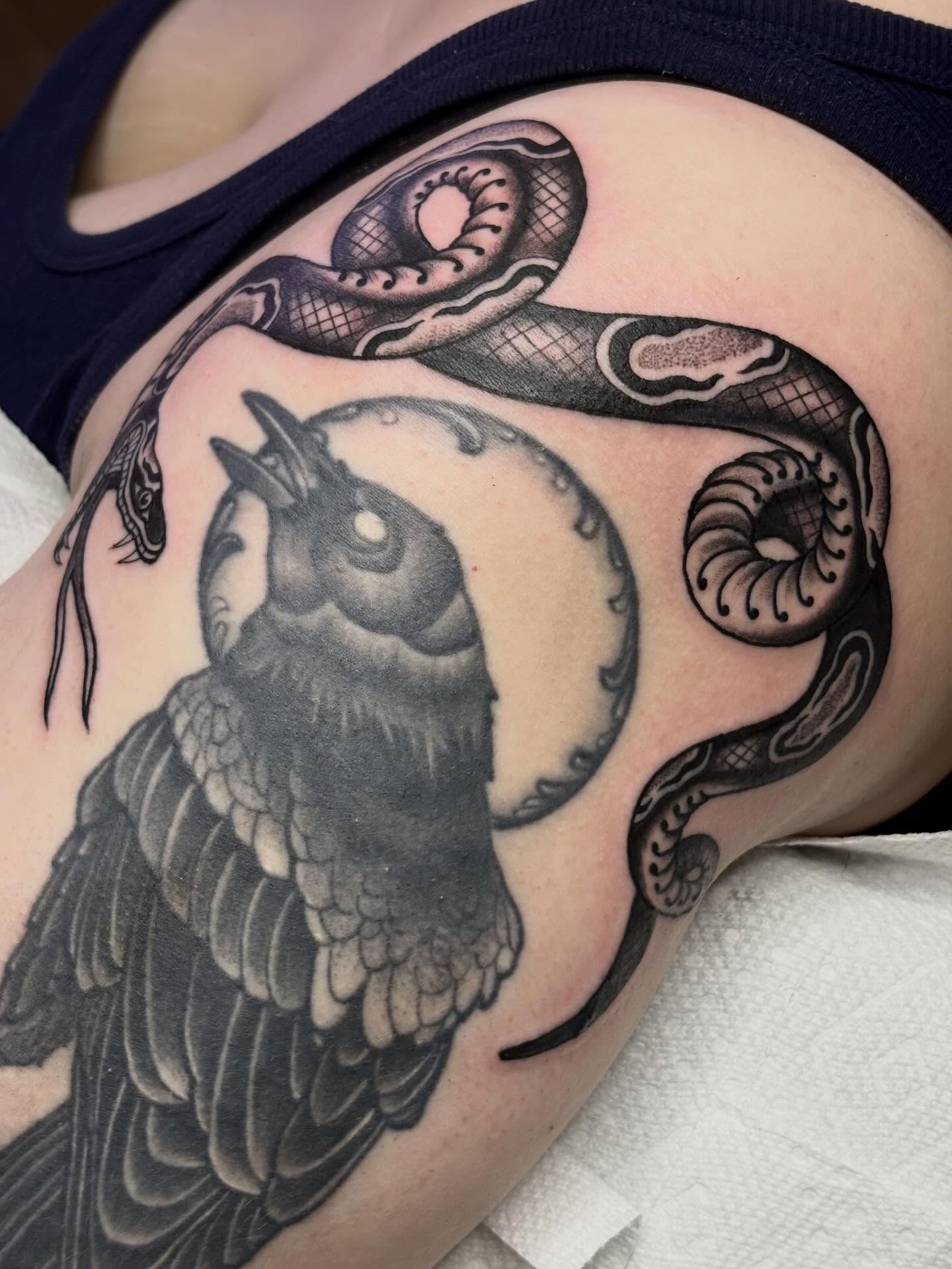 Owl and snake realism tattoo on the shoulder by Sydney Pflaumer