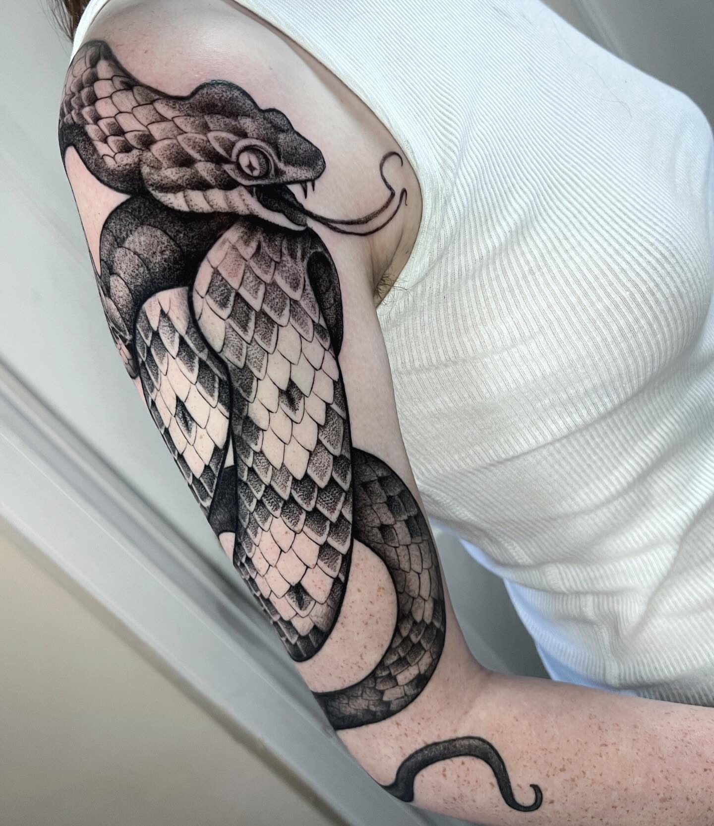 Snake black and grey tattoo on the forearm by Anna Wolff, Richmond, Virginia