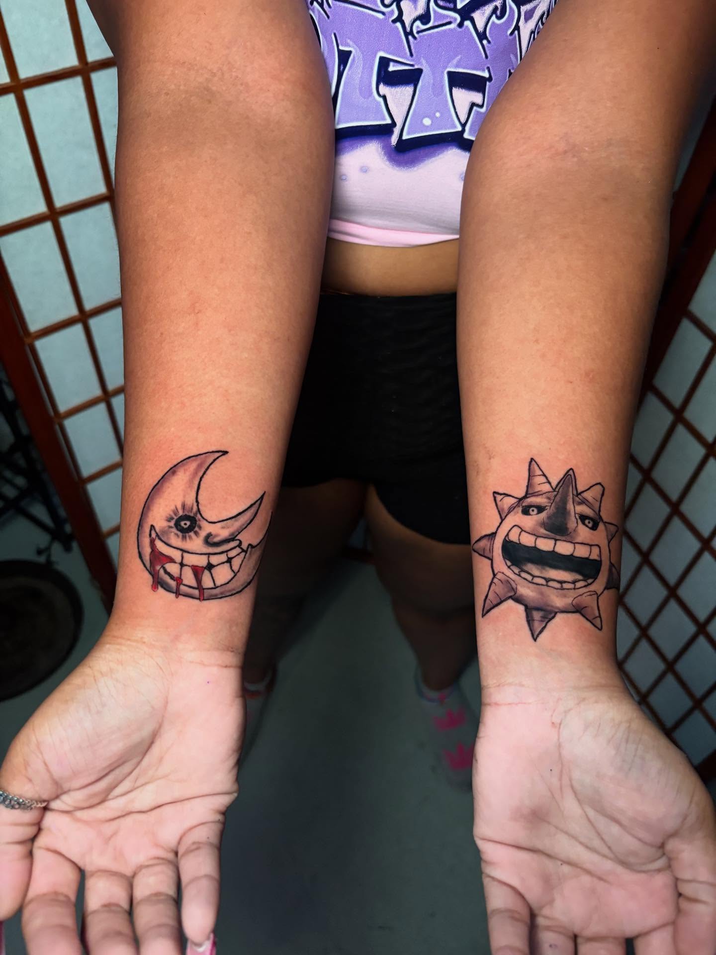 Moon and sun American traditional tattoo on the forearm by D. Davis