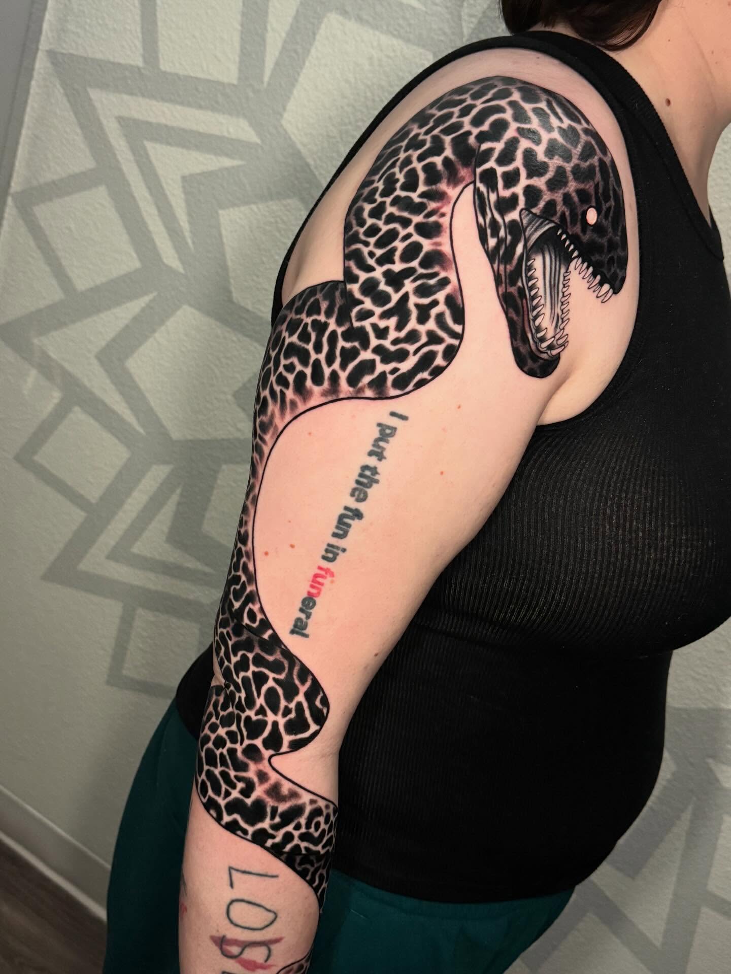 Snake realism tattoo on the upper arm by Las Vegas Tattoo Artist, Las Vegas, Nevada