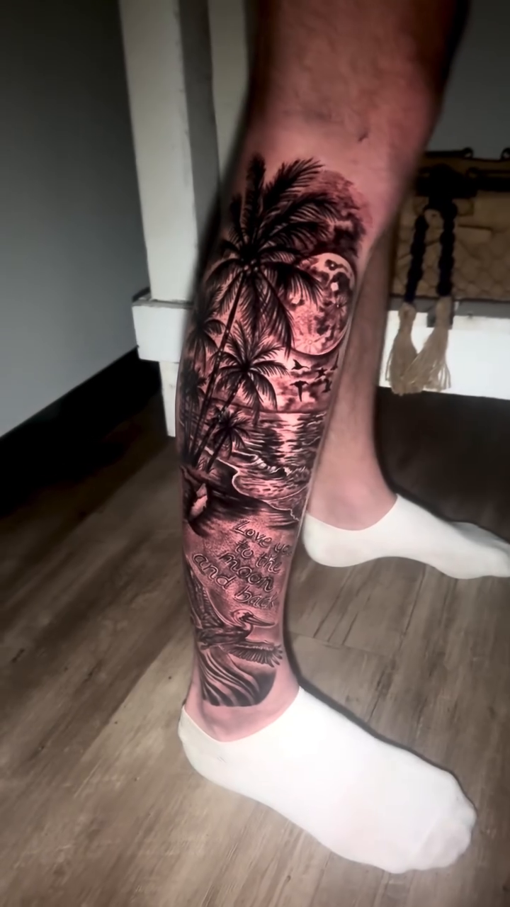 Palm trees and ocean waves realism tattoo by Tampa tattoo artist