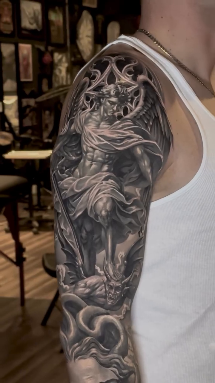 St. Michael and Medusa sleeve realism tattoo by Bailey Hancock