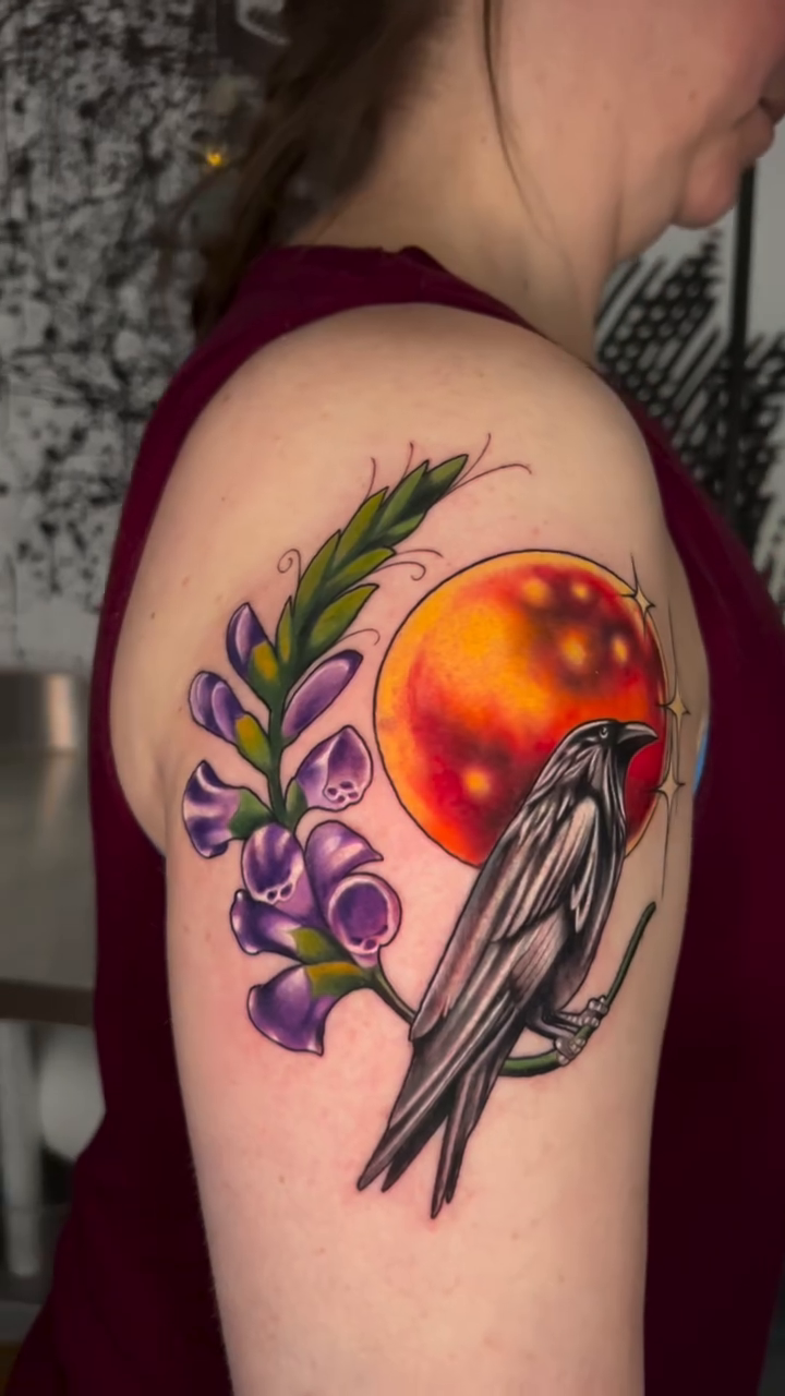 Bird with moon and flowers watercolor tattoo on the shoulder by High Vibrations