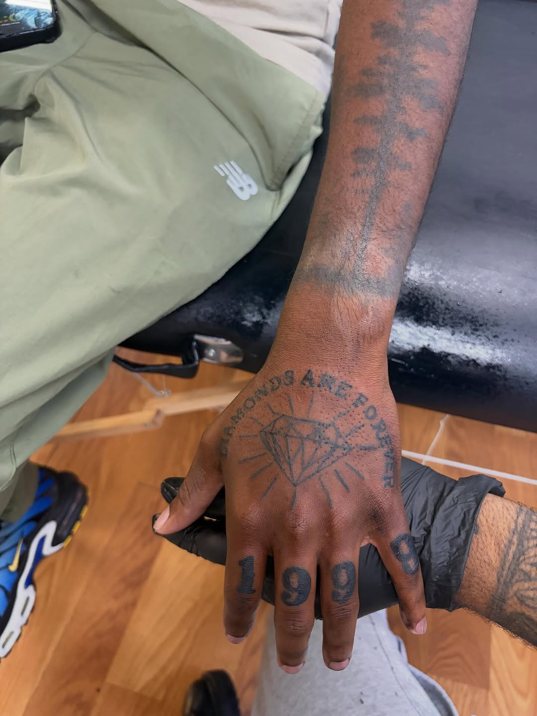 Diamond and numbers tattoo on the hand by Jae the artist🫡