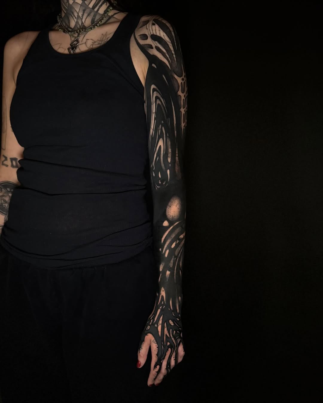 Abstract blackwork sleeve blackwork tattoo on the upper arm by Dylan Orbock, Berkeley, California