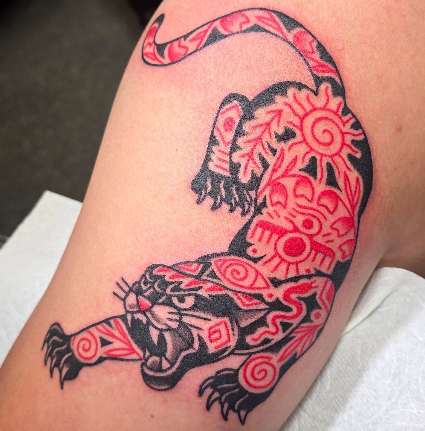 Panther American traditional tattoo on the thigh by A. Teixeira, Los Angeles, California