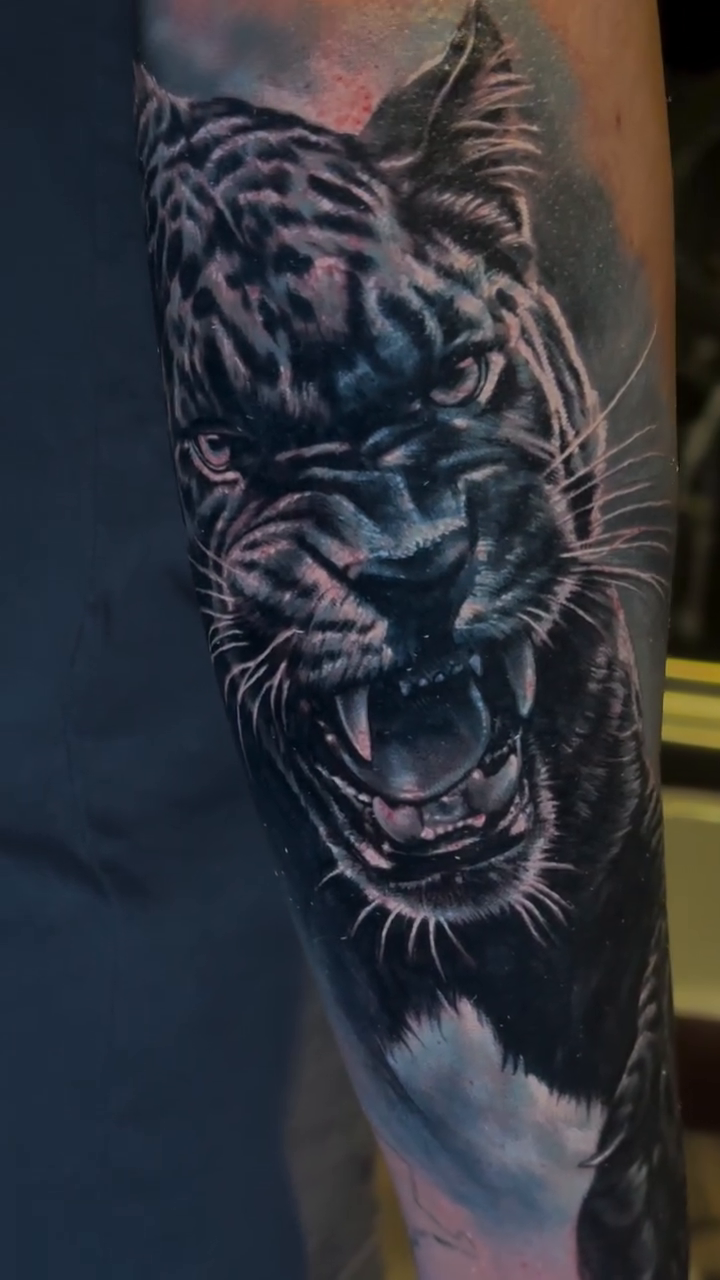 Tiger head realism tattoo by Bailey Hancock