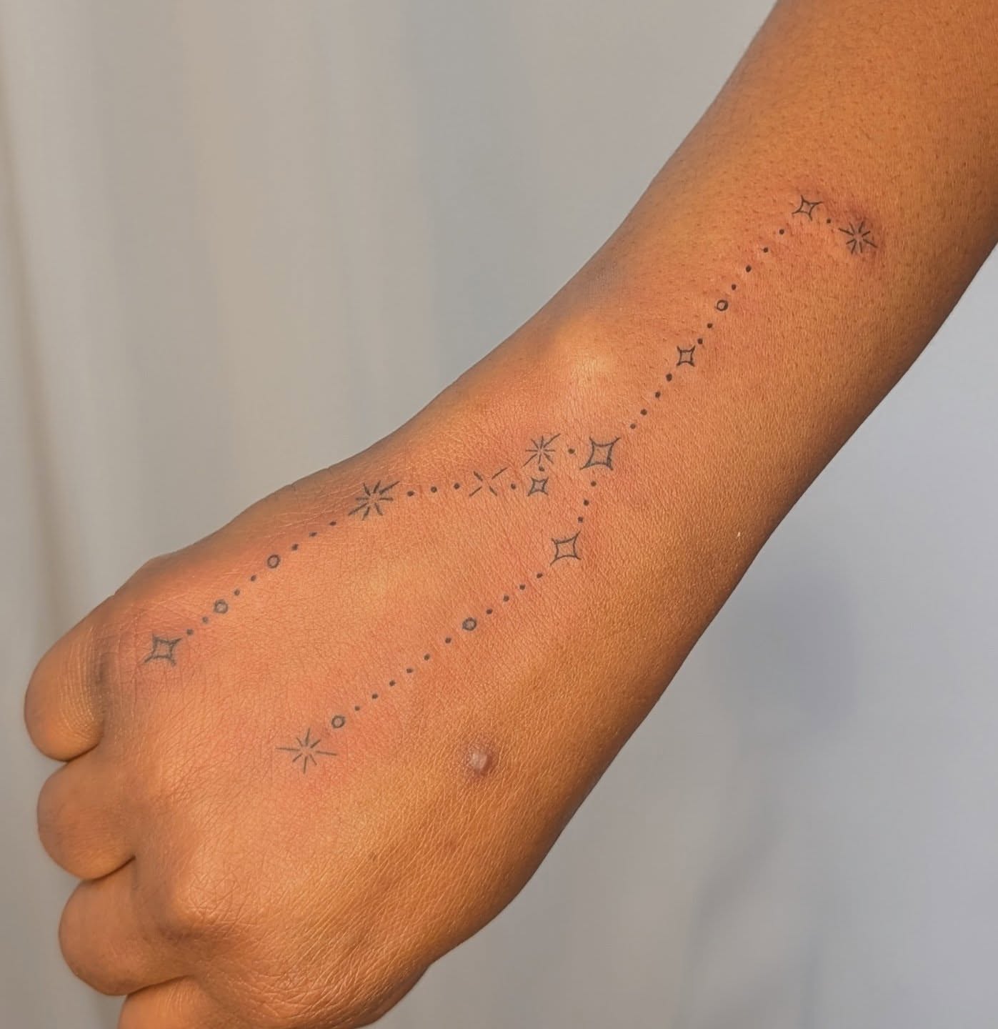 Constellation dotwork tattoo on the hand by Nenookaasi Martin