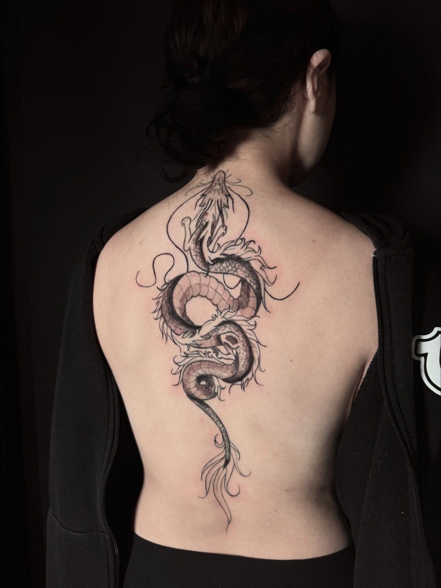 Dragon black and grey tattoo on the back by Alex Cantor