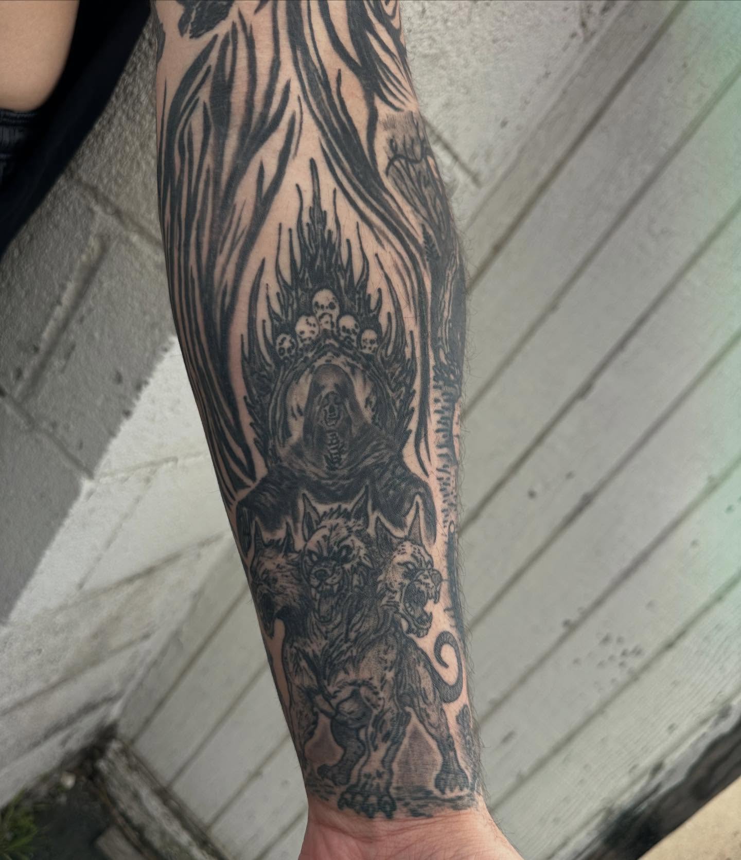 Tattoo by @needlecakeinc — black_and_grey, dark_realism