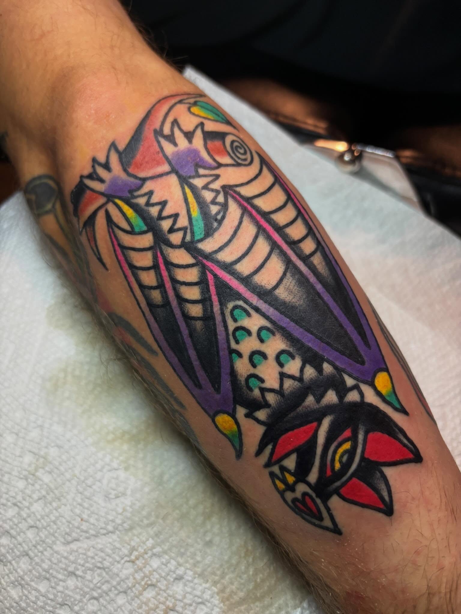 Dragon American traditional tattoo on the forearm by Mitch Ashpaugh