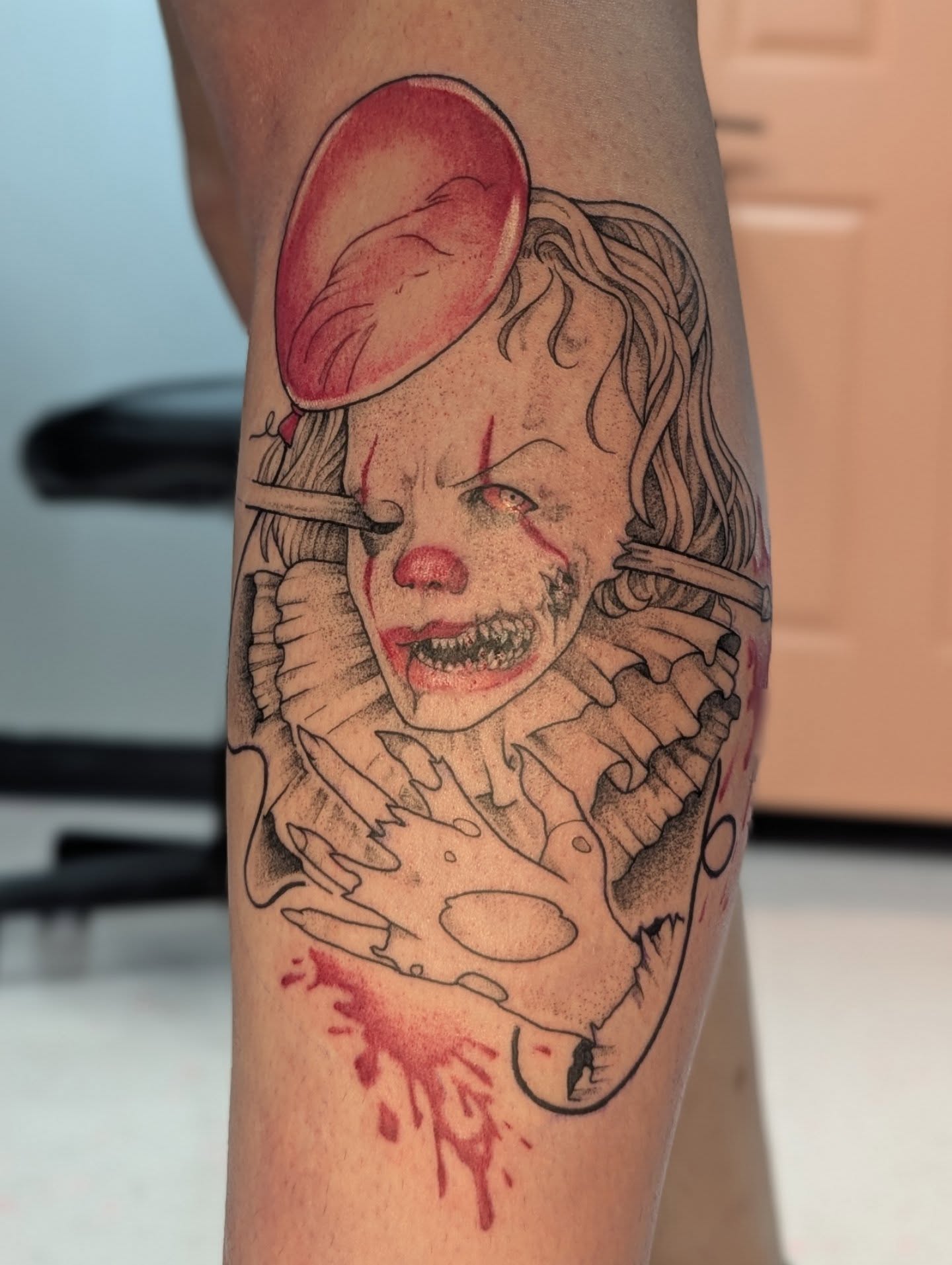 Pennywise realism tattoo on the forearm by Spencer Jennings, Westland, Michigan