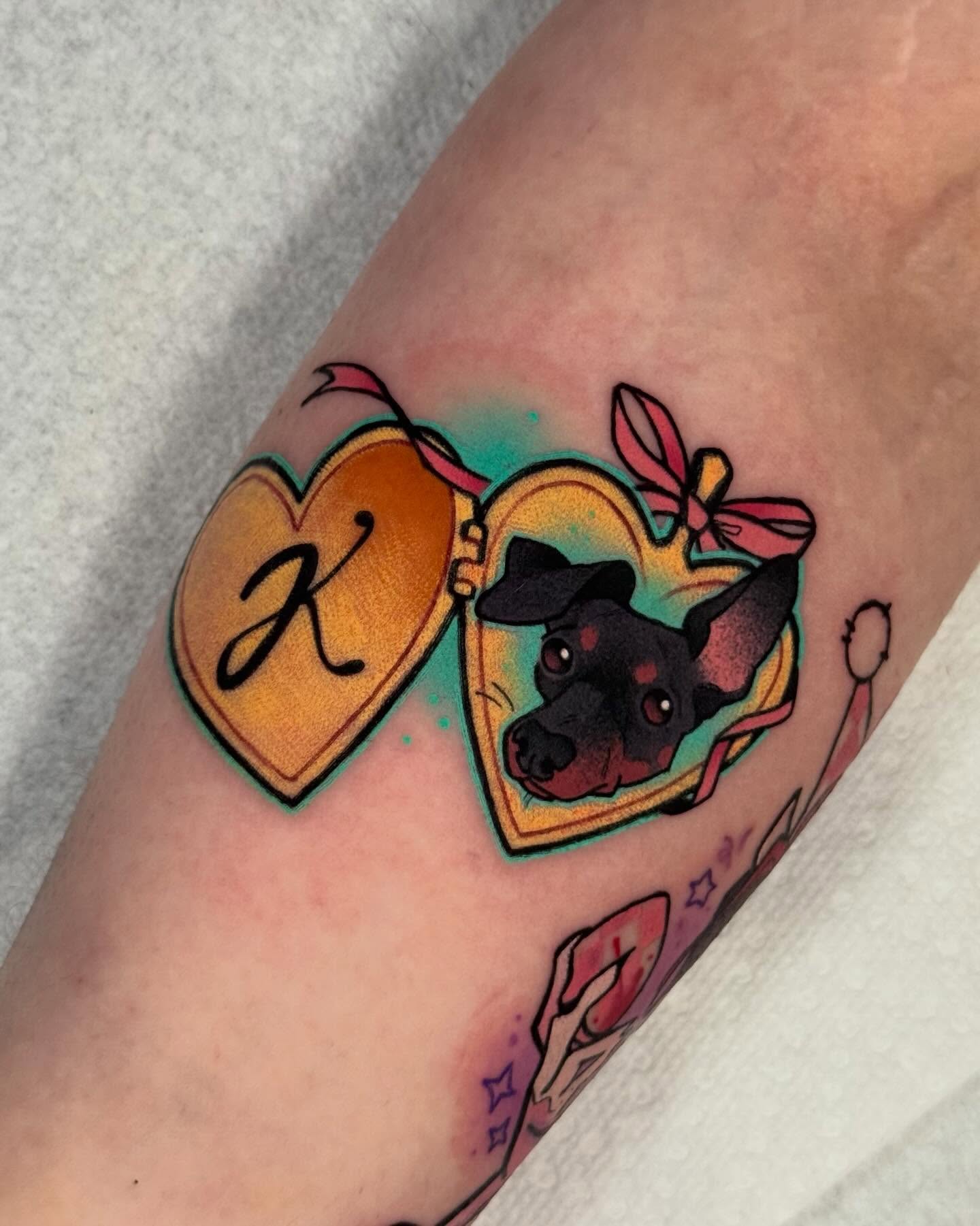 Dog in heart box new school tattoo on the forearm by Taylor Nicoll Chunn