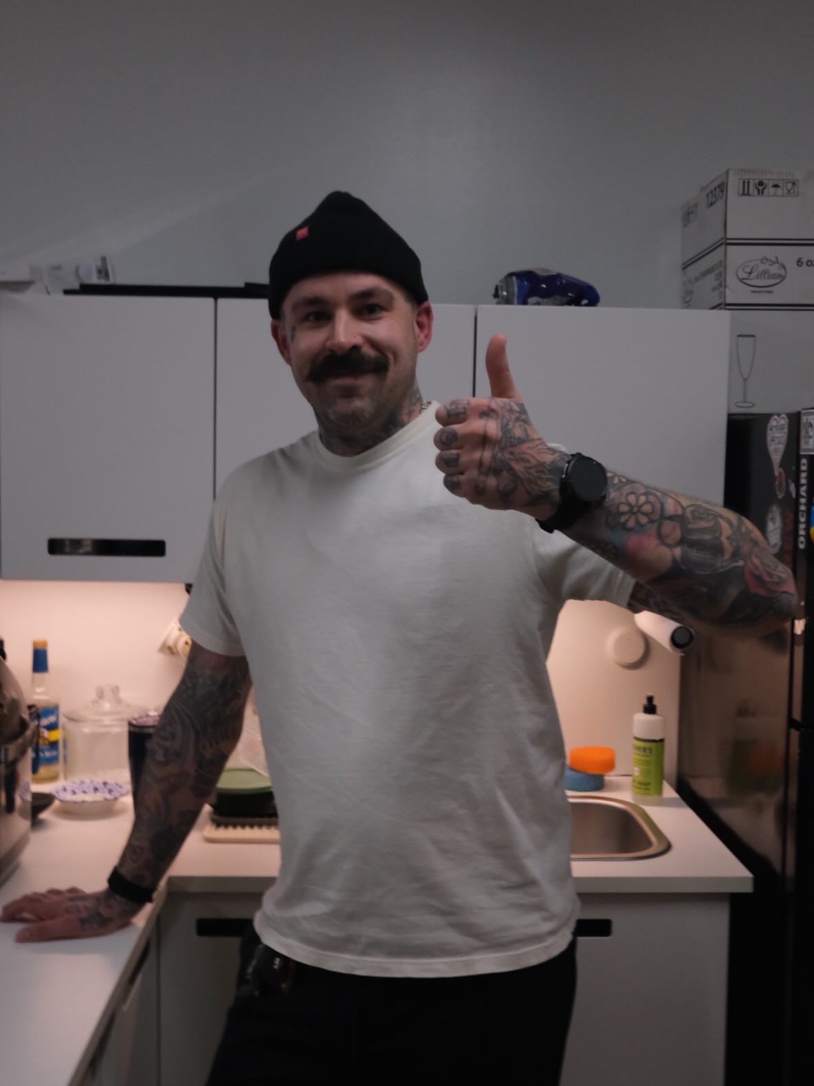 Mustache American traditional tattoo on the upper arm by James Maxwell