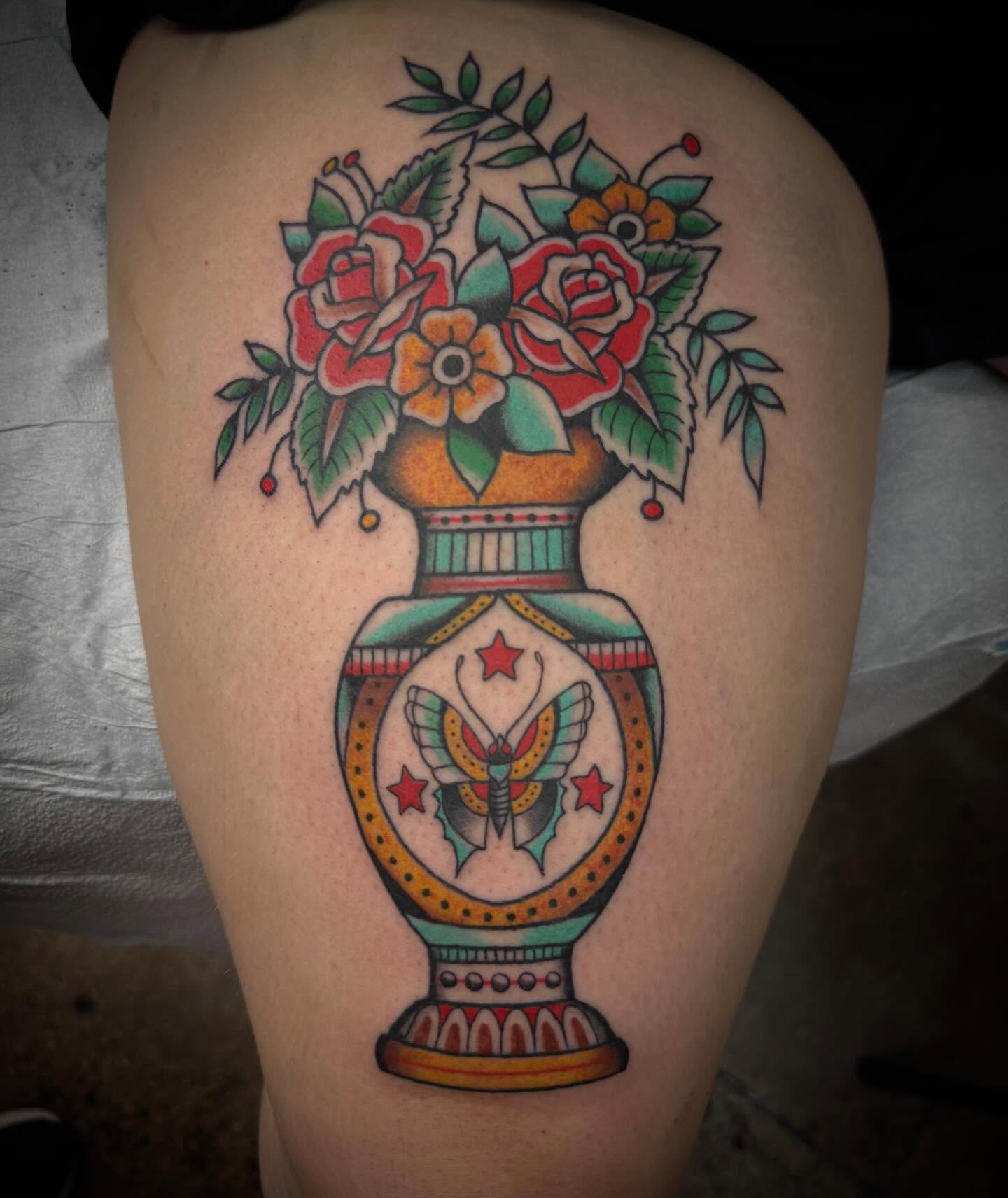 Vase with flowers American traditional tattoo on the thigh by Austin Liebst, Wichita, Kansas