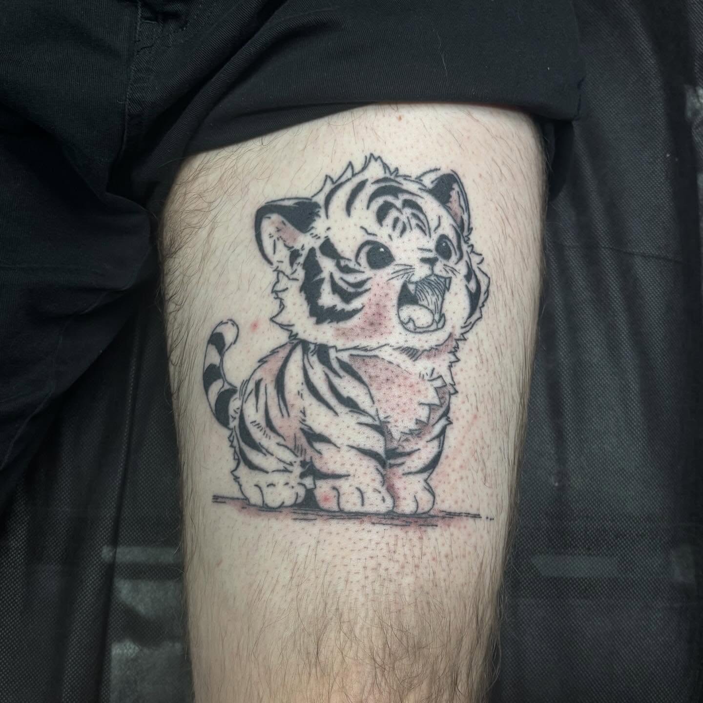 Tiger cub dotwork tattoo on the thigh by Joe ⋆₊⋆☢︎⁺₊⚠︎₊⋆