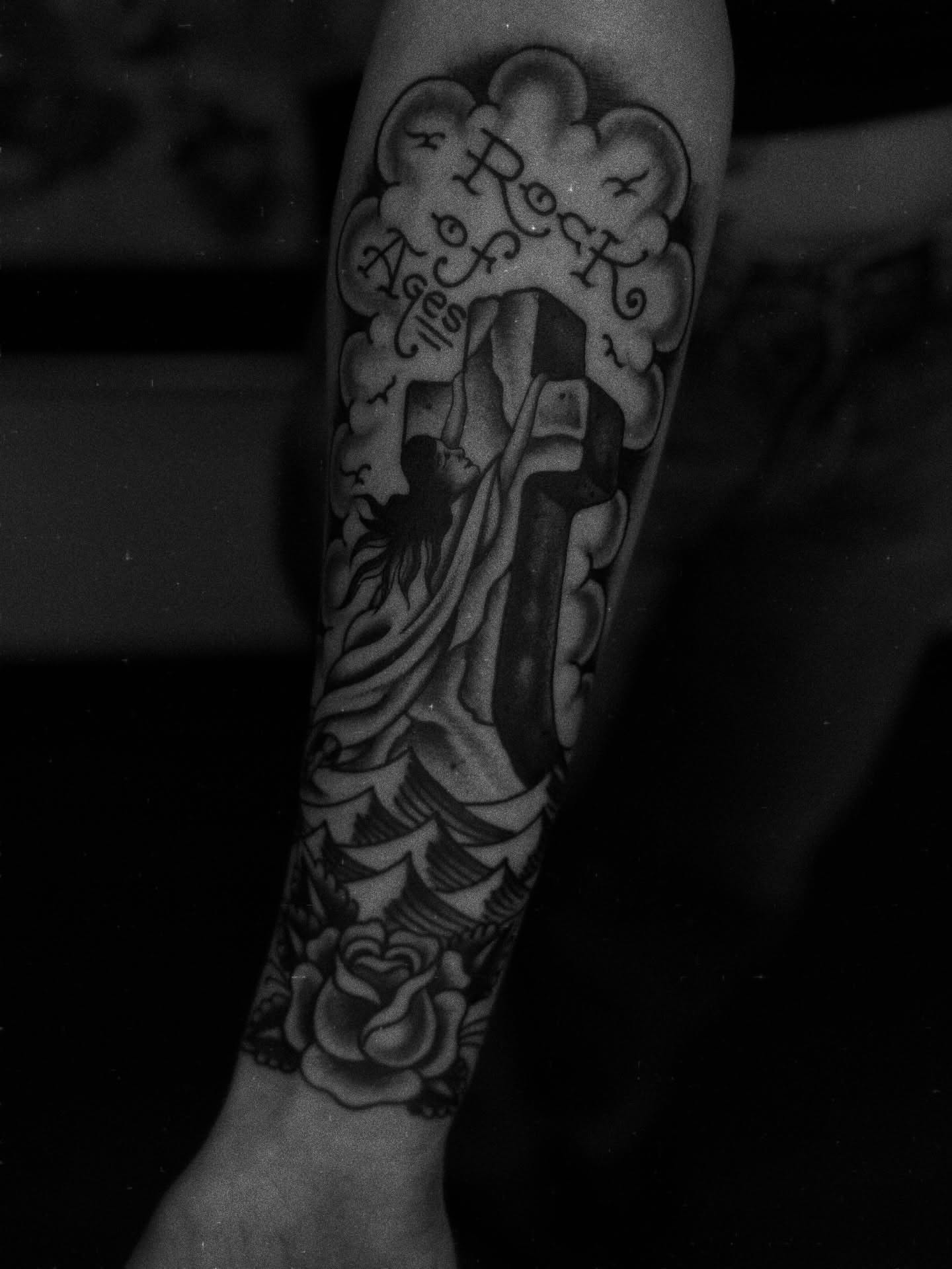 Religious scene American traditional tattoo on the forearm by Ben Karnofsky