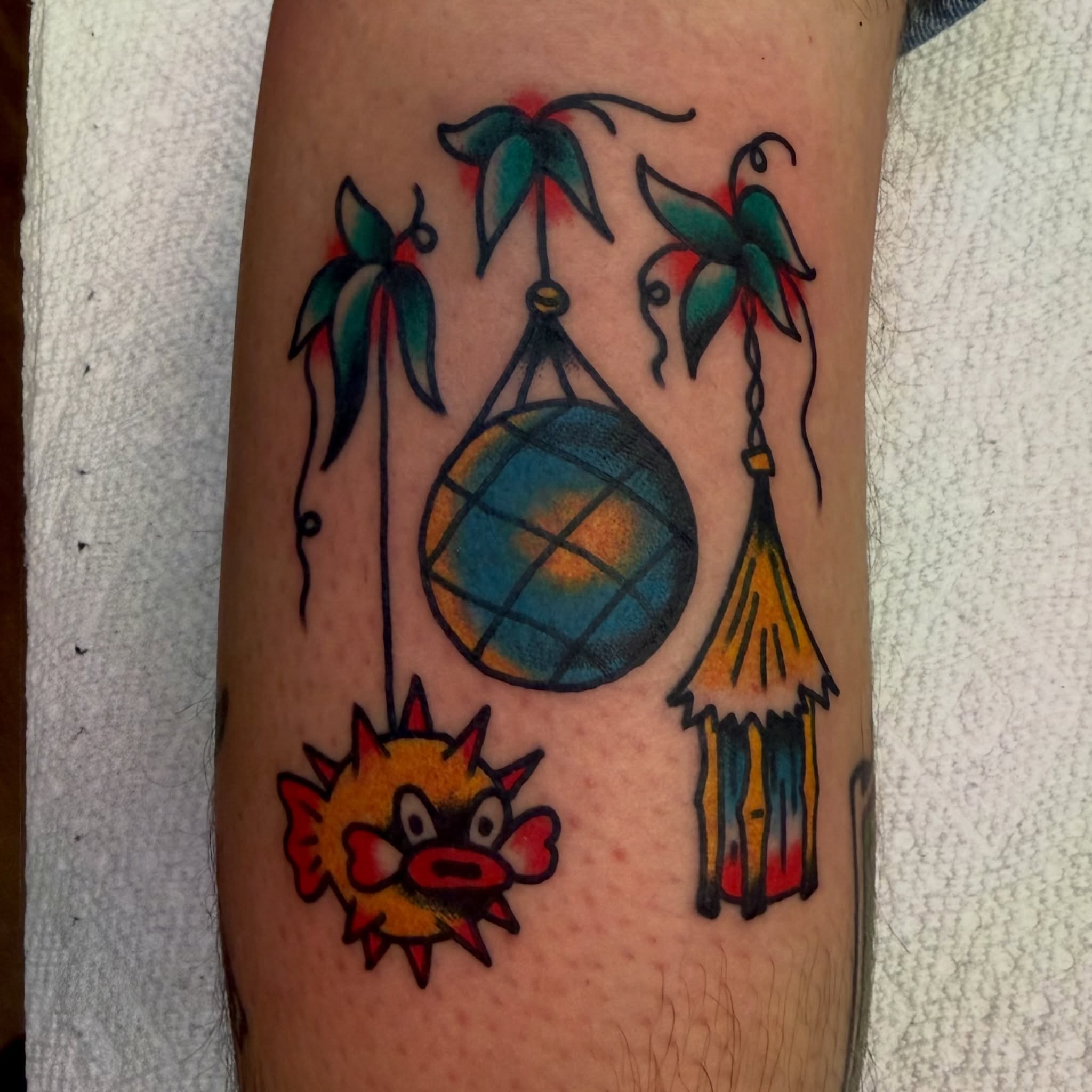 Wind chime American traditional tattoo on the forearm by Buddy (Holiday) Orr, Las Vegas, Nevada