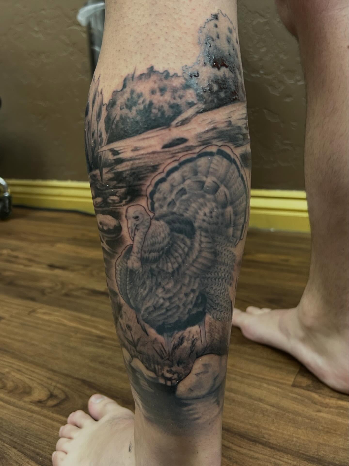 Turkey realism tattoo on the calf by Tim Wilson