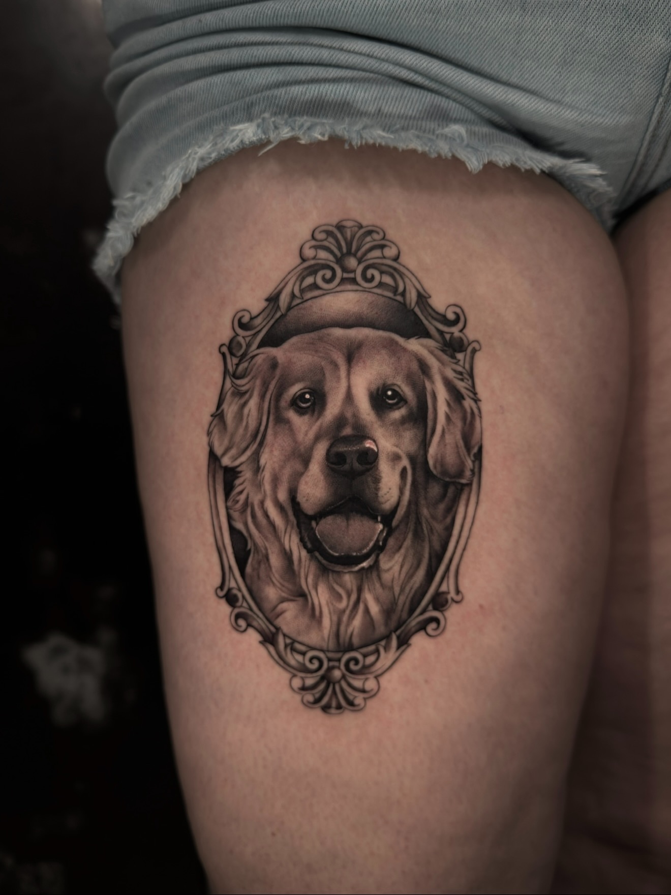 Dog portrait realism tattoo on the thigh by Mel K Lockett - Nashville Tattoo Artist