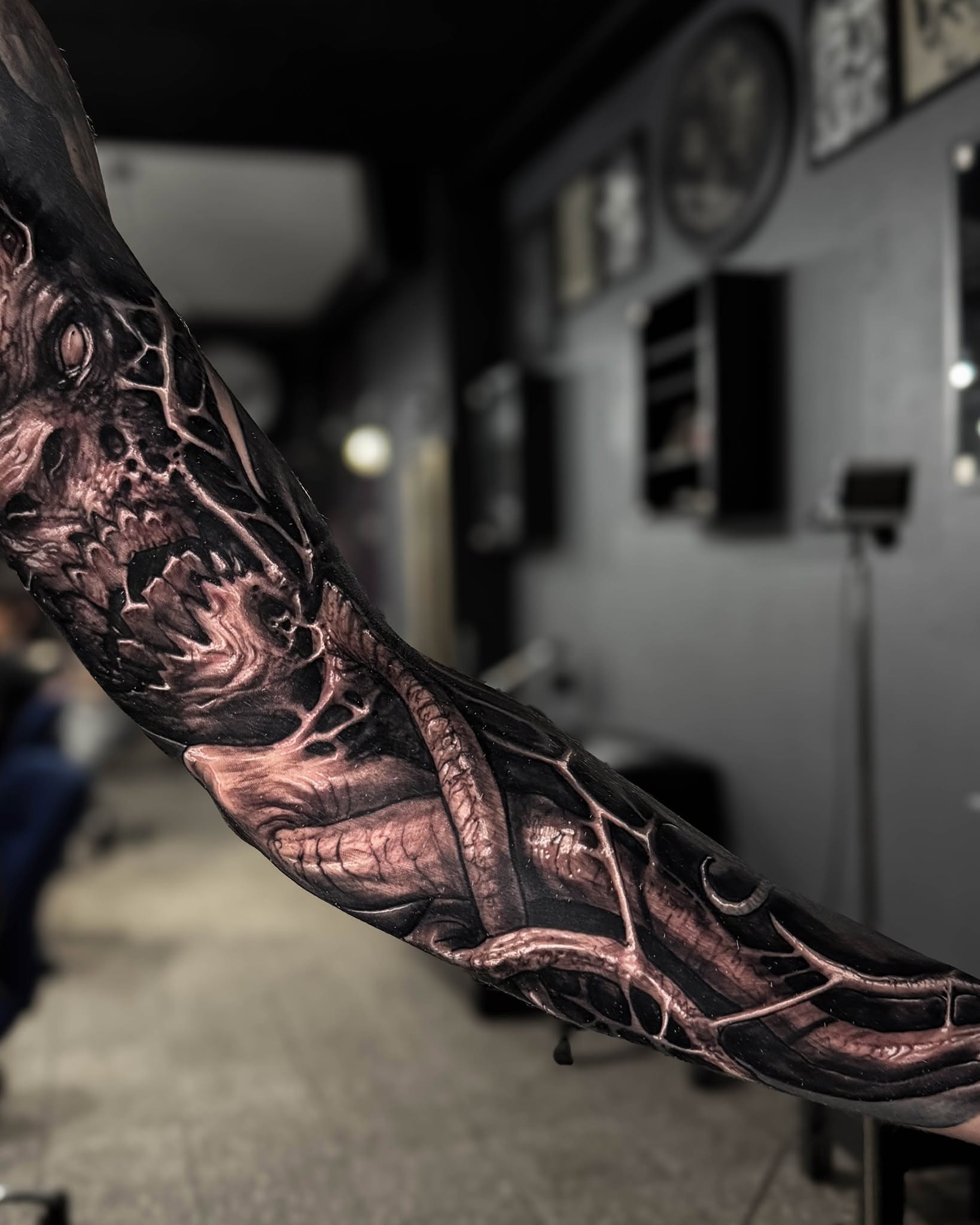 Dragon dark realism tattoo on the forearm by Bruno Moretti