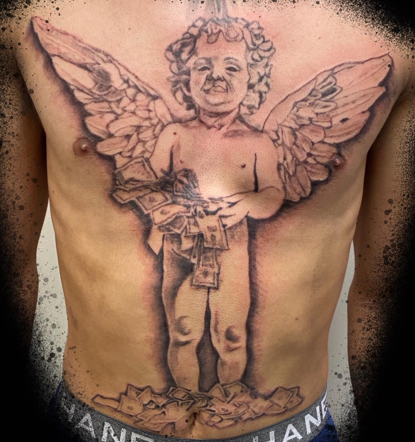 Tattoo by @moving_muralsart — black_and_grey