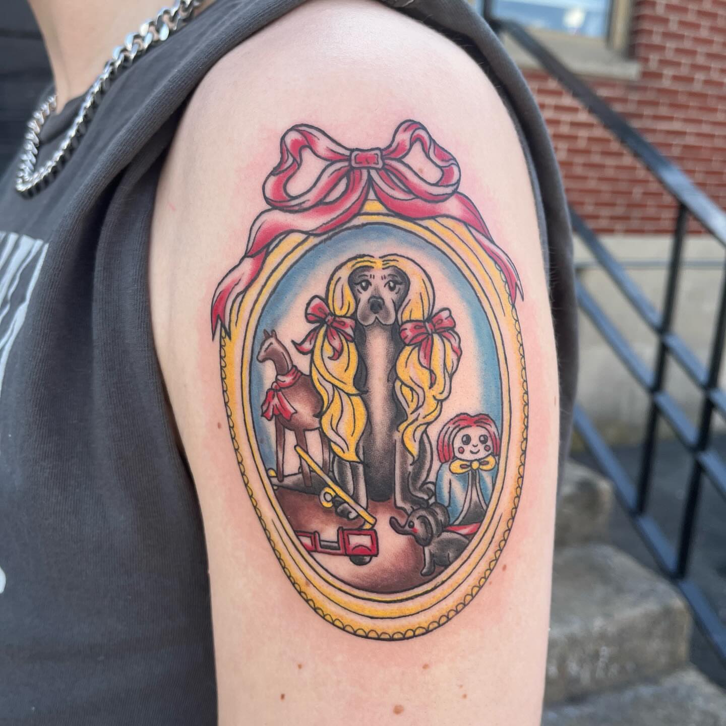 Dog portrait American traditional tattoo on the shoulder by sarah
