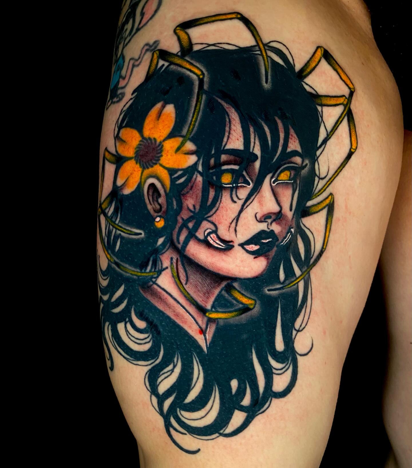 Woman with flower American traditional tattoo on the thigh by Trenton Helms
