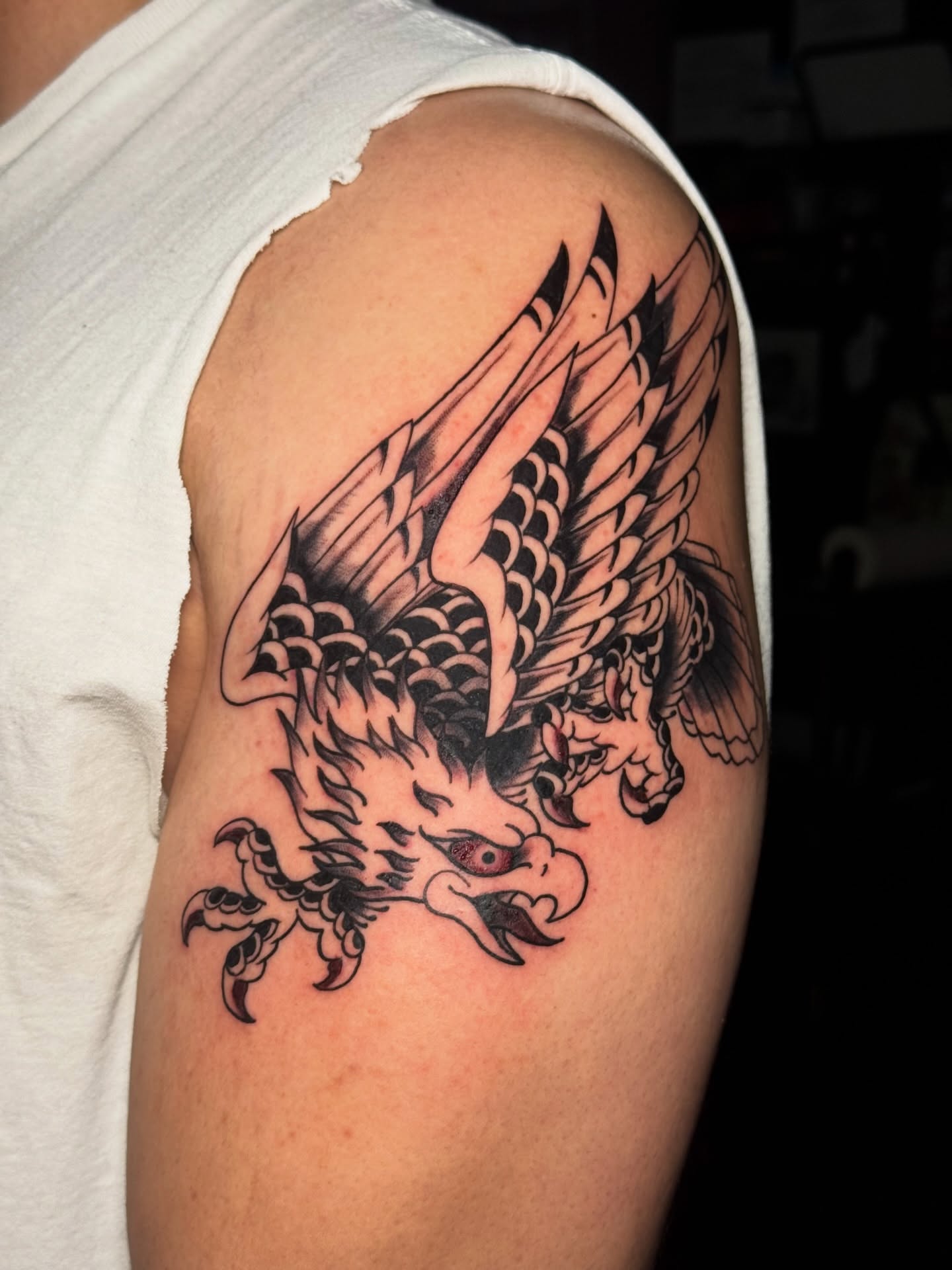 Eagle American traditional tattoo on the shoulder by Matthew - Tattoo Artist