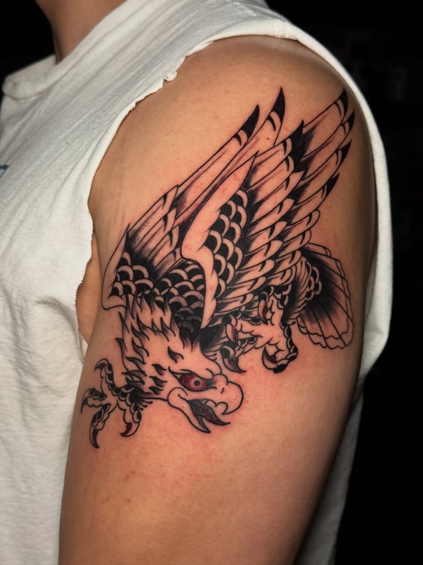 Eagle American traditional tattoo on the shoulder by Matthew - Tattoo Artist