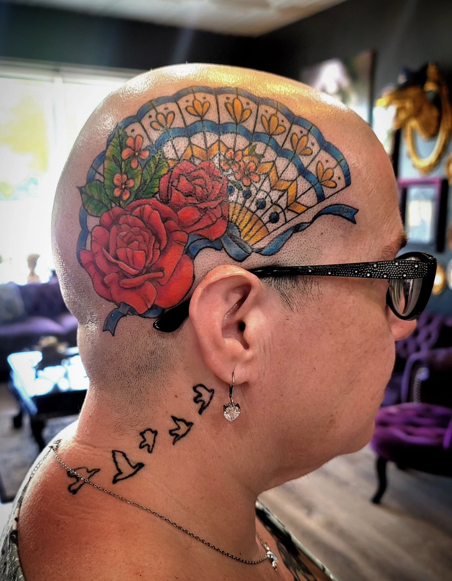 Fan and roses American traditional tattoo on the head by Tricky Lake, Newfield, New Jersey