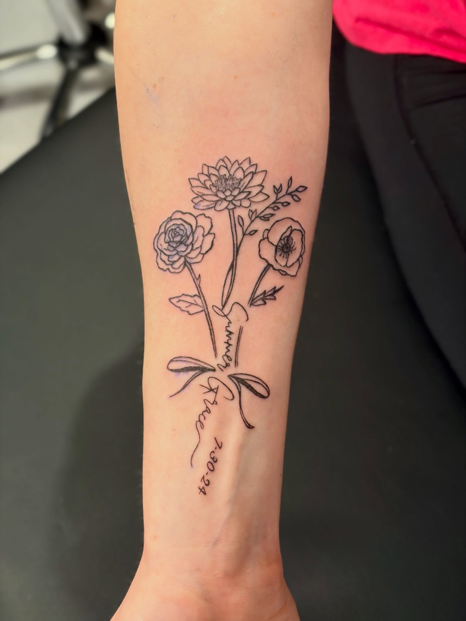 Floral bouquet fine line tattoo on the forearm by Emily, Monticello, Iowa