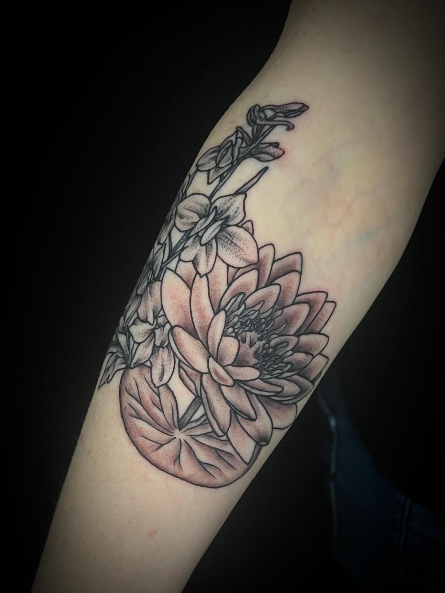 Lotus flower dotwork tattoo on the forearm by Suzanne B