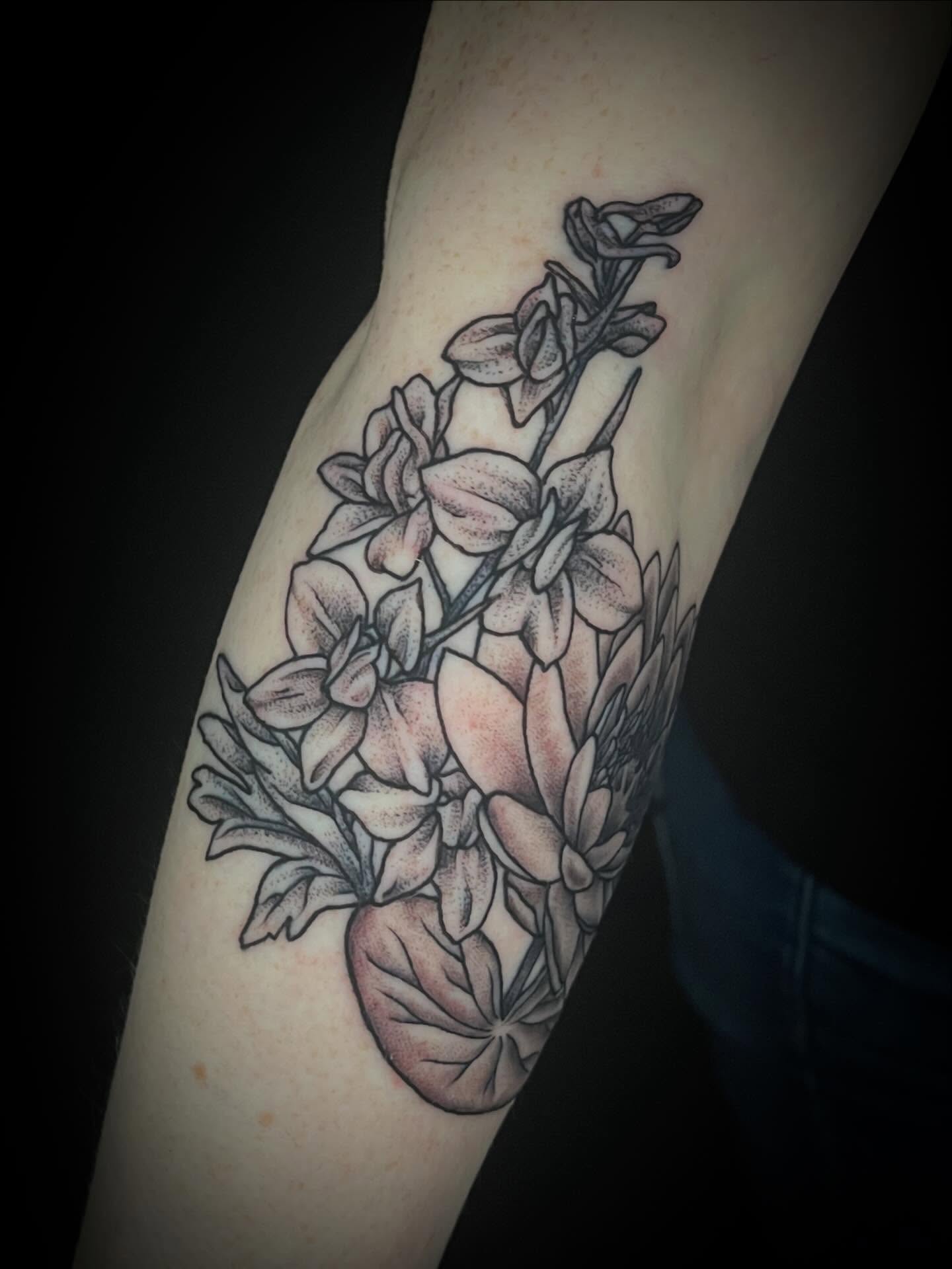 Flowers dotwork tattoo on the forearm by Suzanne B