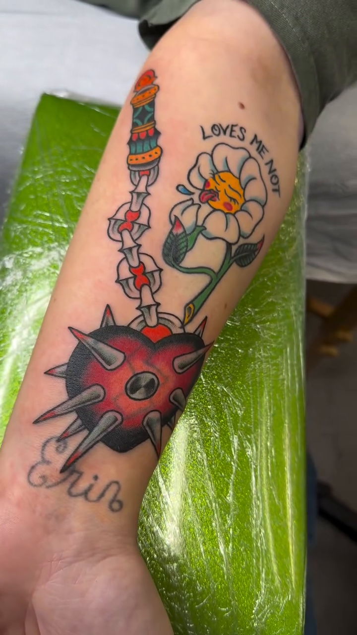 Flower with mace and chain American traditional tattoo on the forearm by Joseph Kuma Warren, Memphis, Tennessee