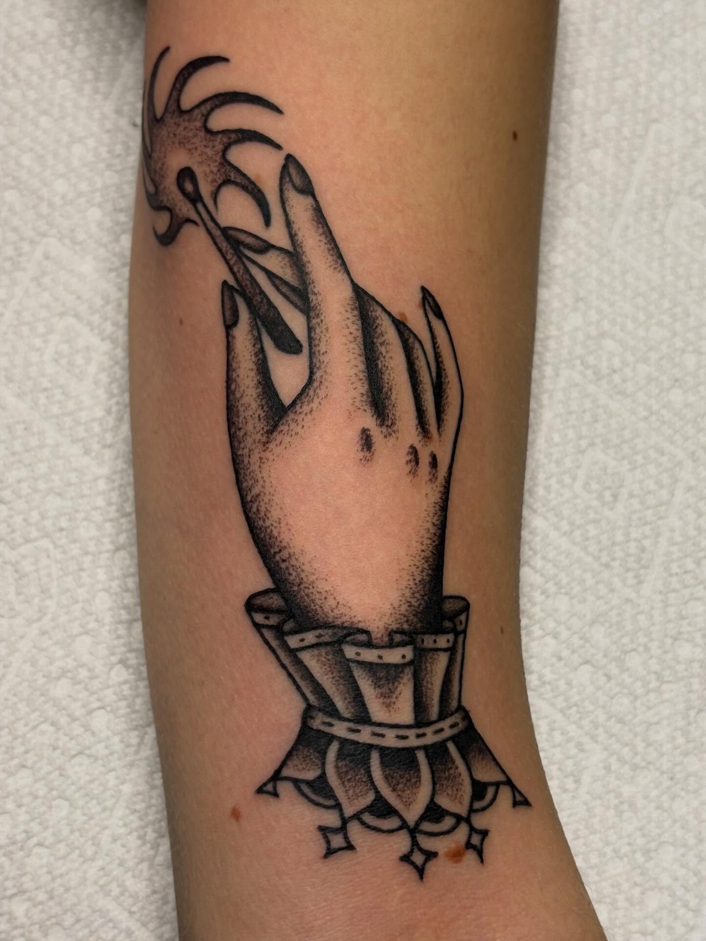 Praying hand dotwork tattoo on the forearm by Sydney Pflaumer