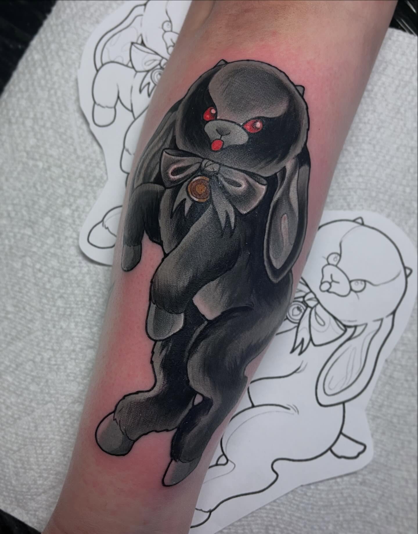 Black rabbit dark realism tattoo on the forearm by 🌿Izzy🌿