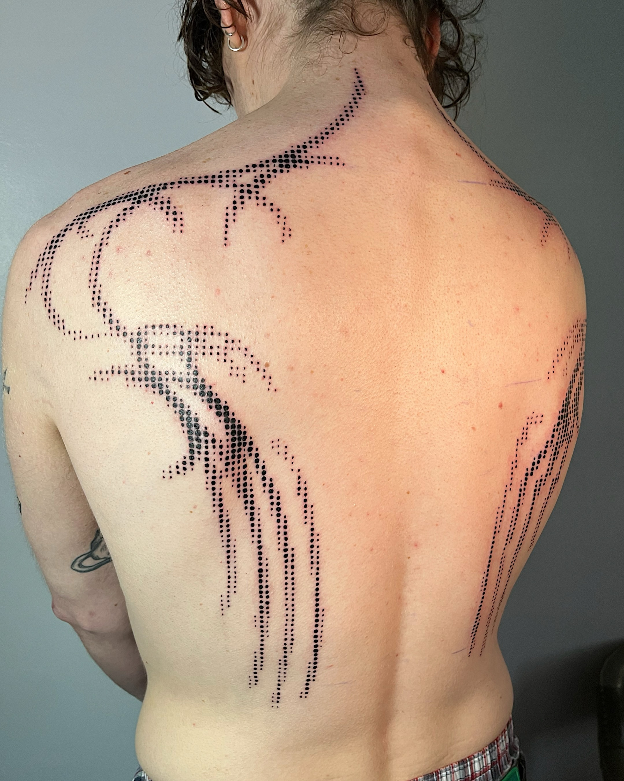 Deer dotwork tattoo on the back by Azucena