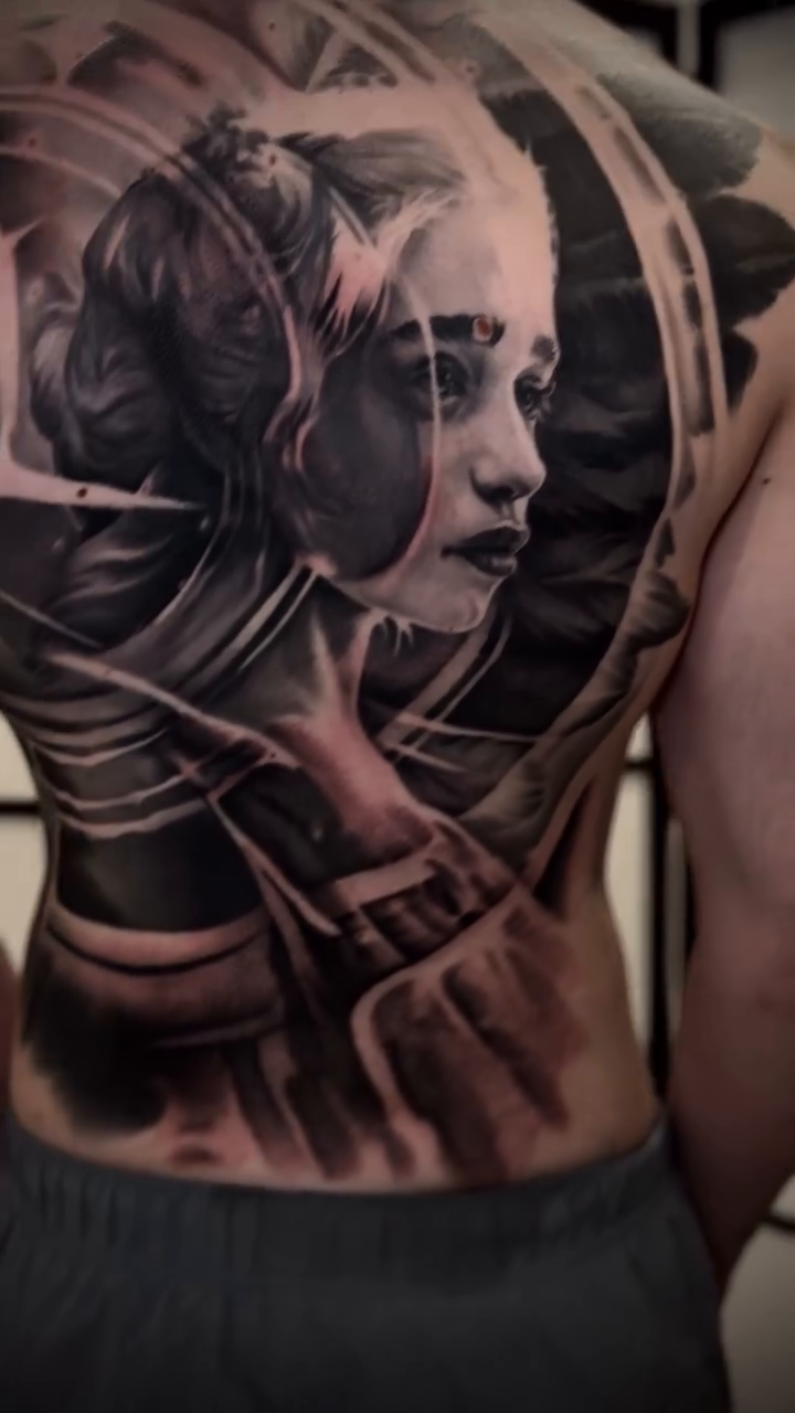 Woman and mechanical elements realism tattoo by Tony Ink