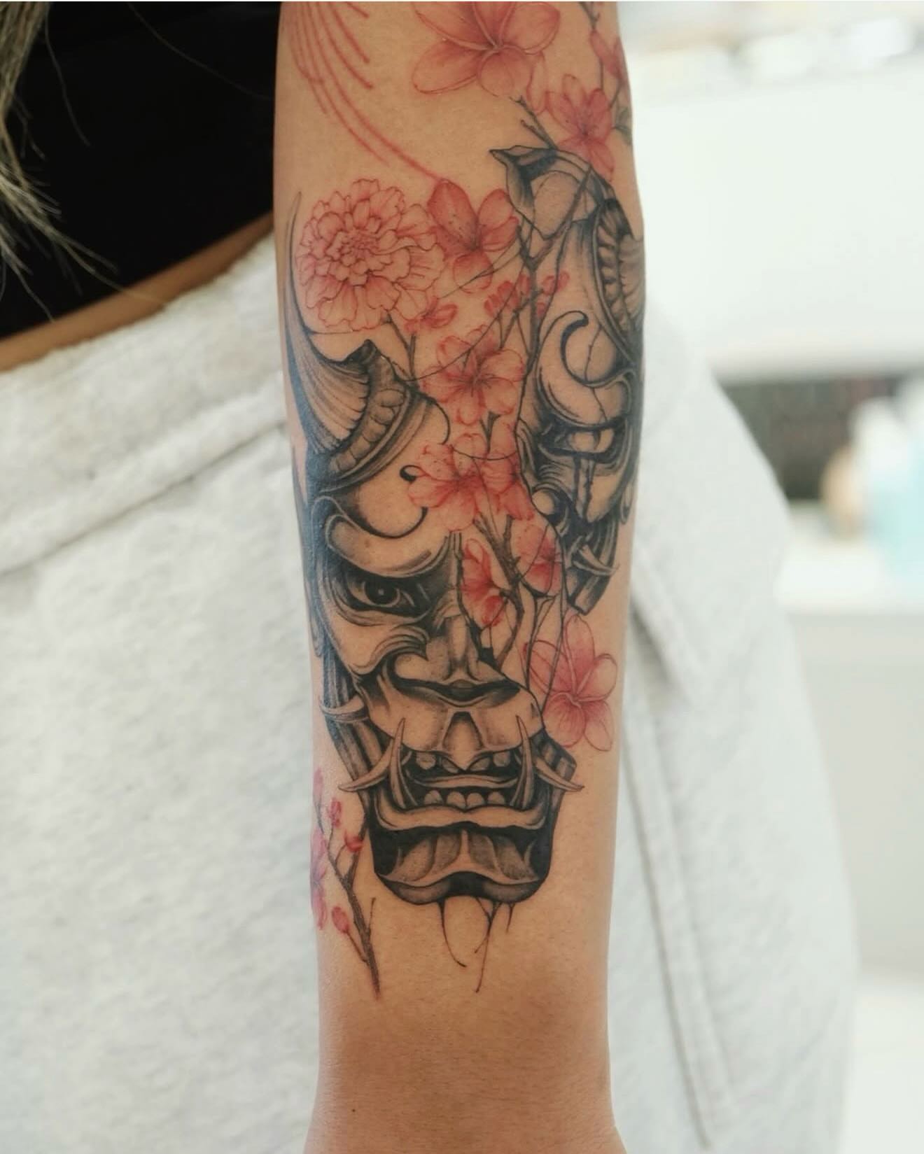 Mask with flowers japanese irezumi tattoo on the forearm by MJ tattooist