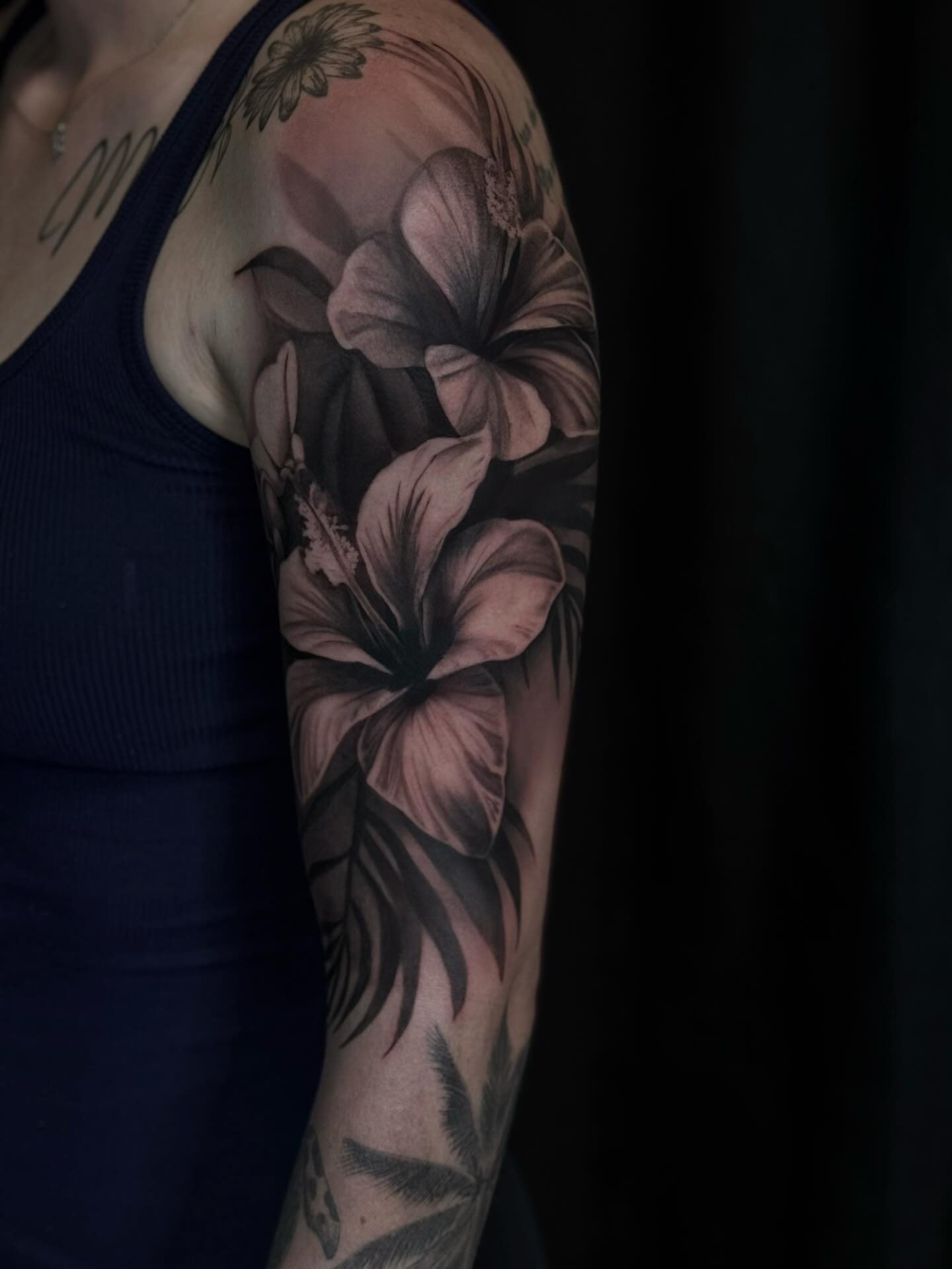 Hibiscus flowers realism tattoo on the upper arm by ❖ Raven Lennox ❖