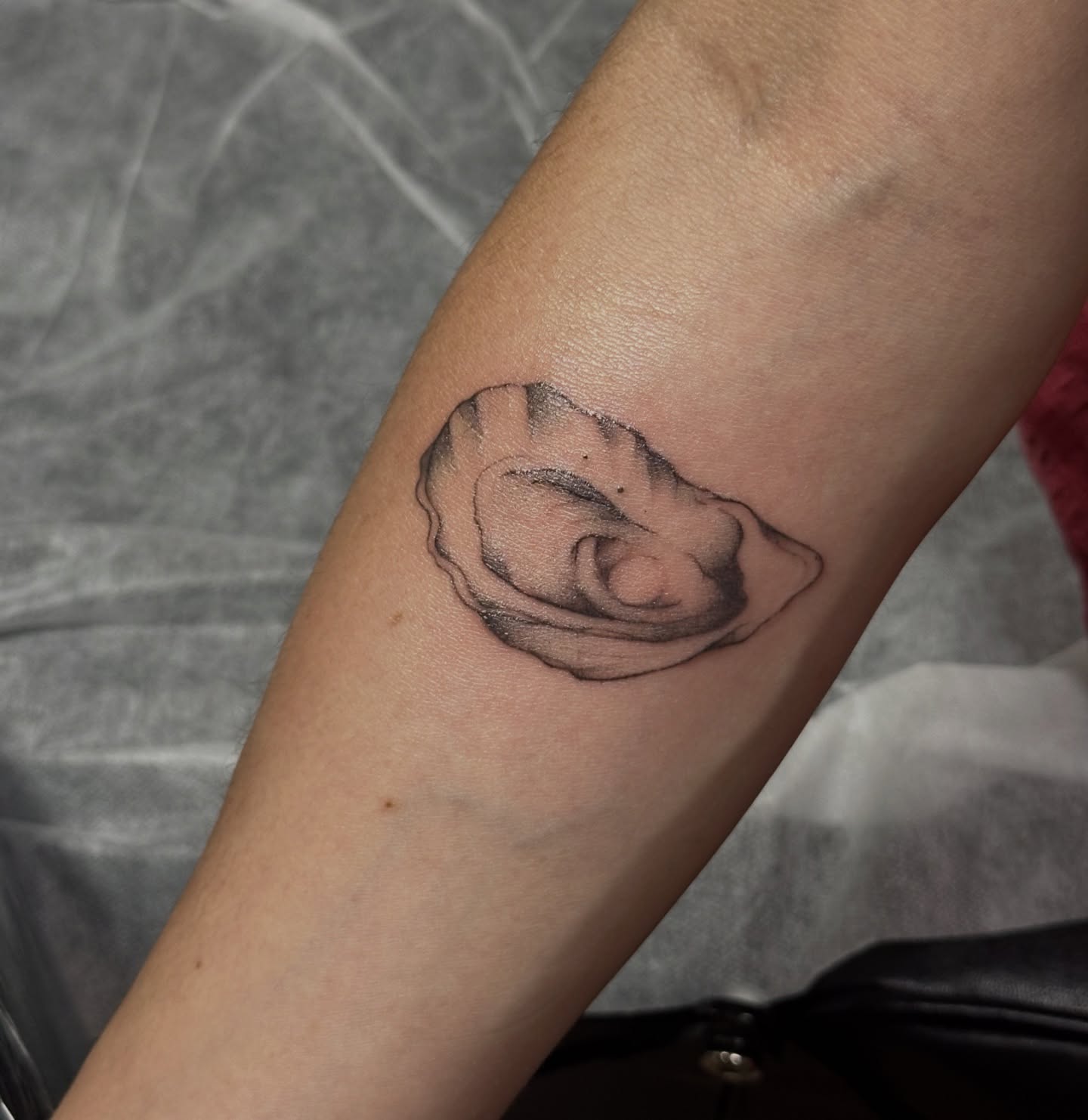 Ear realism tattoo on the forearm by Jocelyn