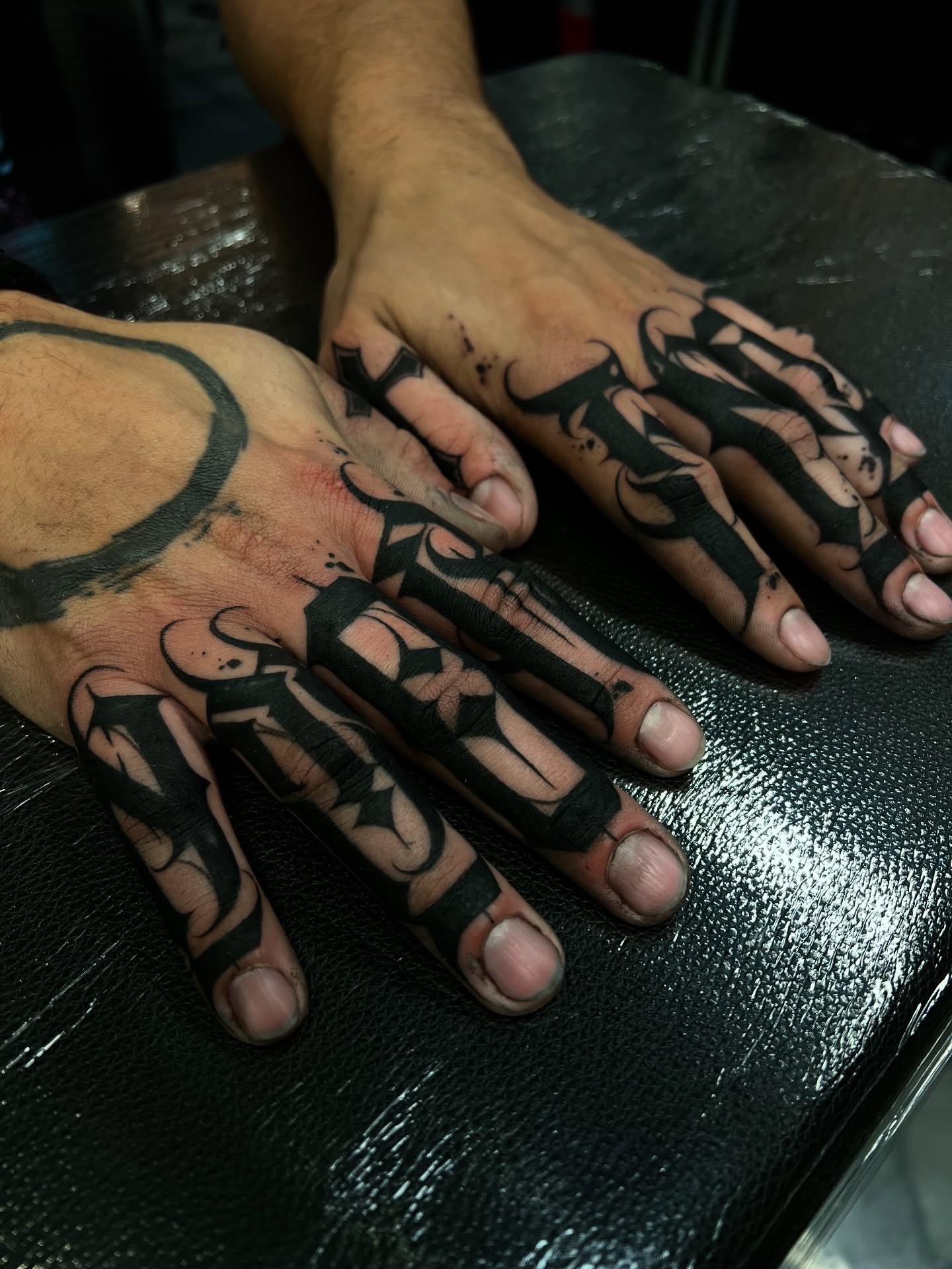 Hand black and grey tattoo on the hand by Lettering