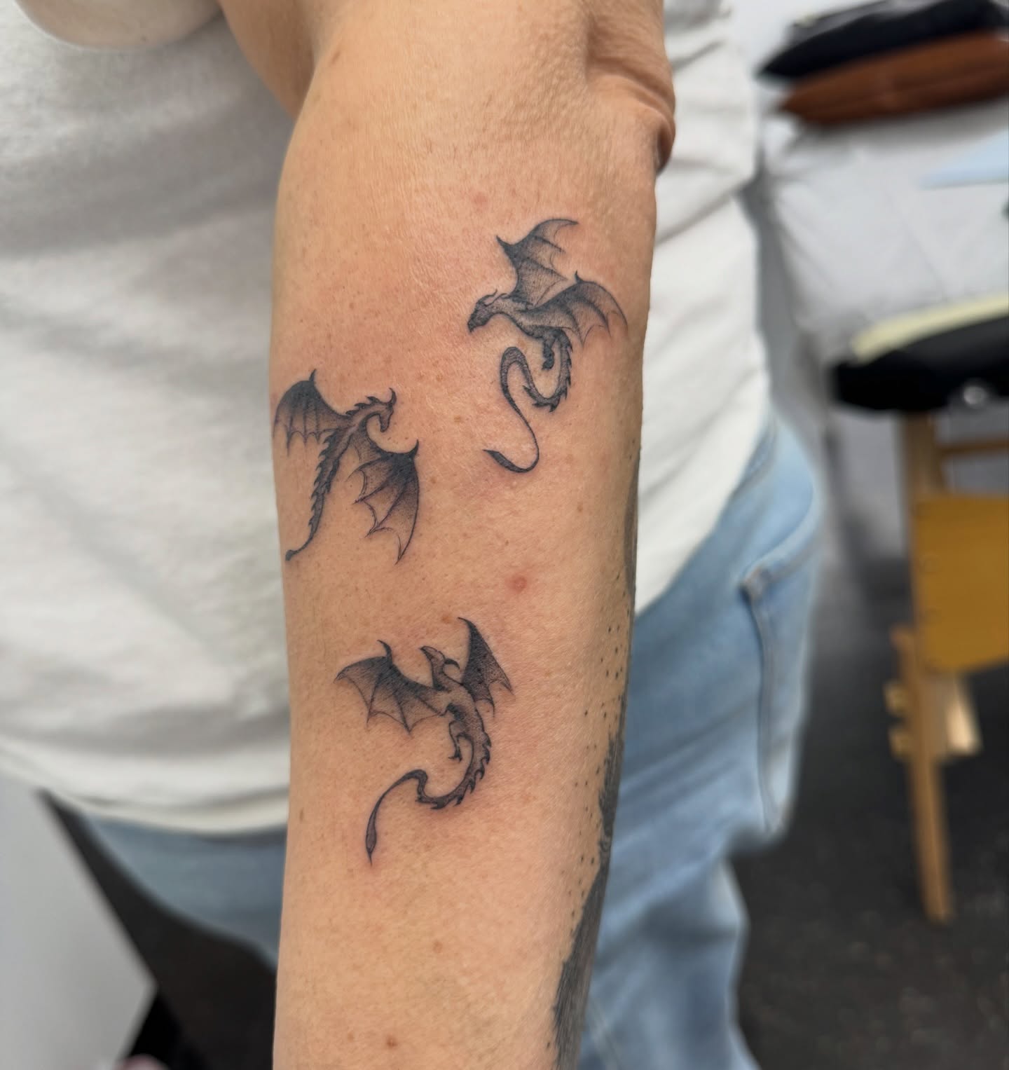Dragons black and grey tattoo on the forearm by πππππ¨π¨ ππ«ππ’π¬π